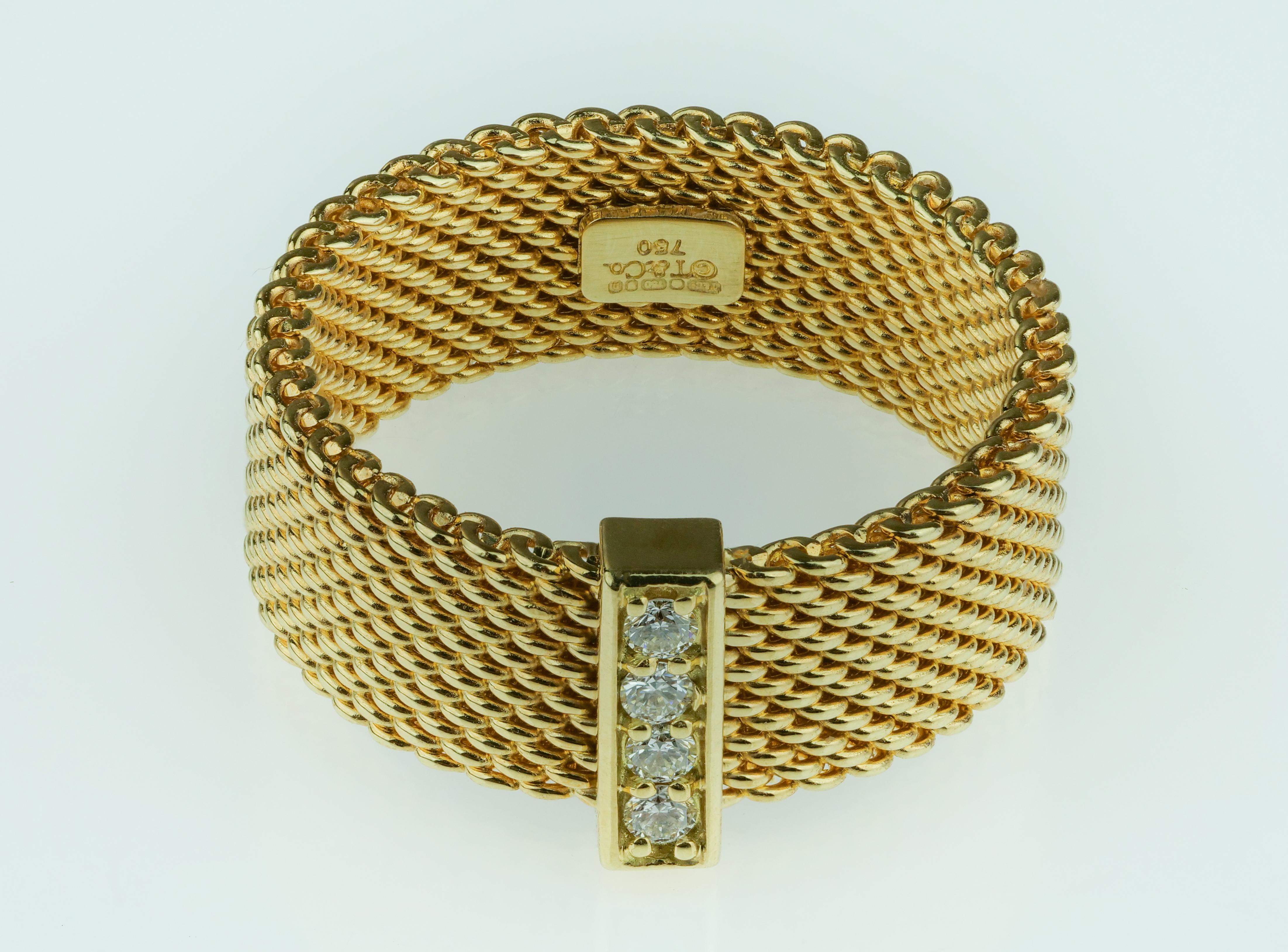 Tiffany & Co Somerset Ring aus 18k Gelbgold und Diamanten:: bestehend aus eleganten geflochtenen Gliedern:: verziert mit Diamanten. 
4 x Diamant mit rundem Brillantschliff:: ungefähres Gesamtgewicht 0::10 ct 
UK Ringgröße 