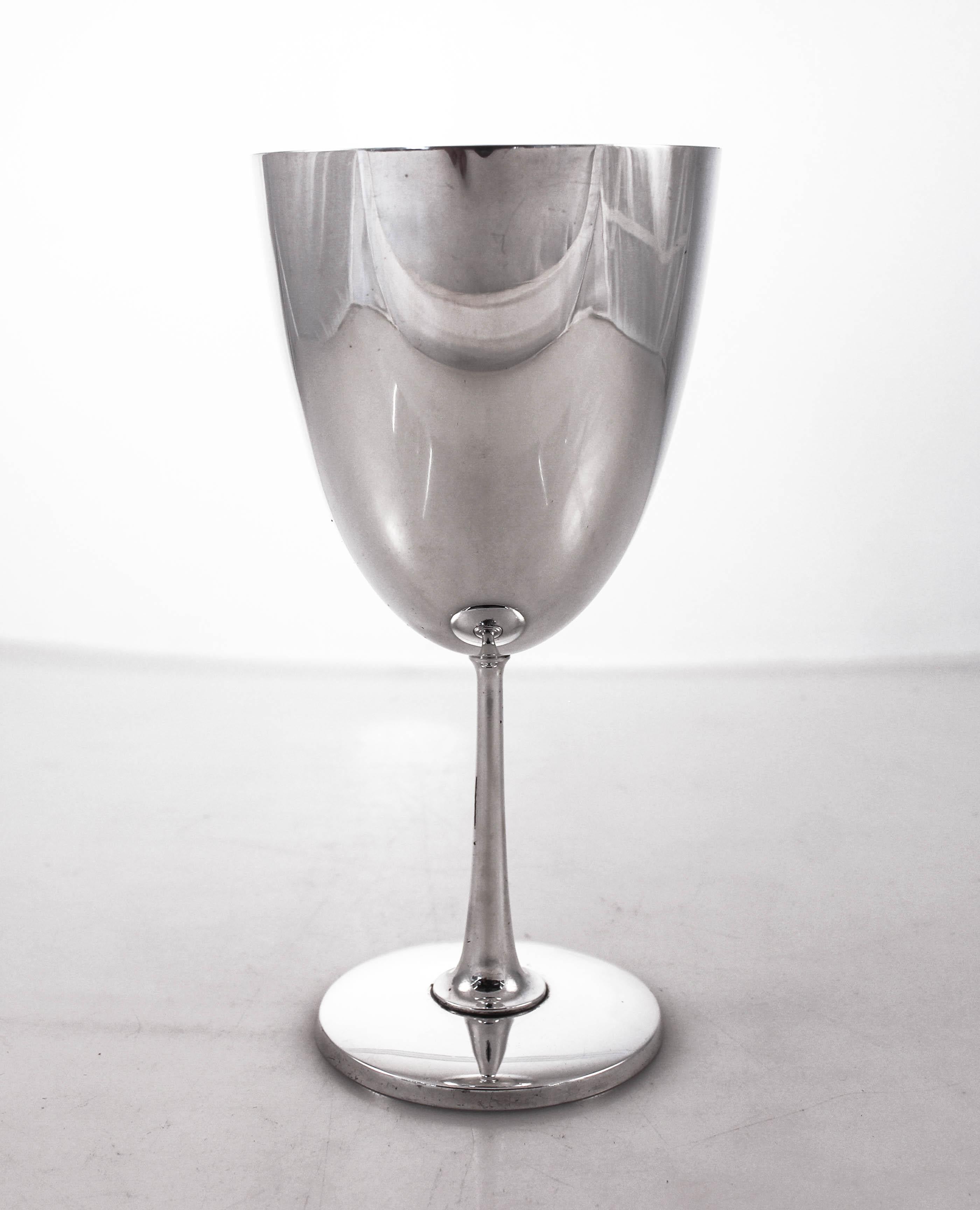 Sterling and Tiffany; two words that go well together. Here is a sterling silver midcentury goblet by the world renowned silver company, Tiffany. Straight lines and a simple understated shape make for a sophisticated and elegant piece. This piece