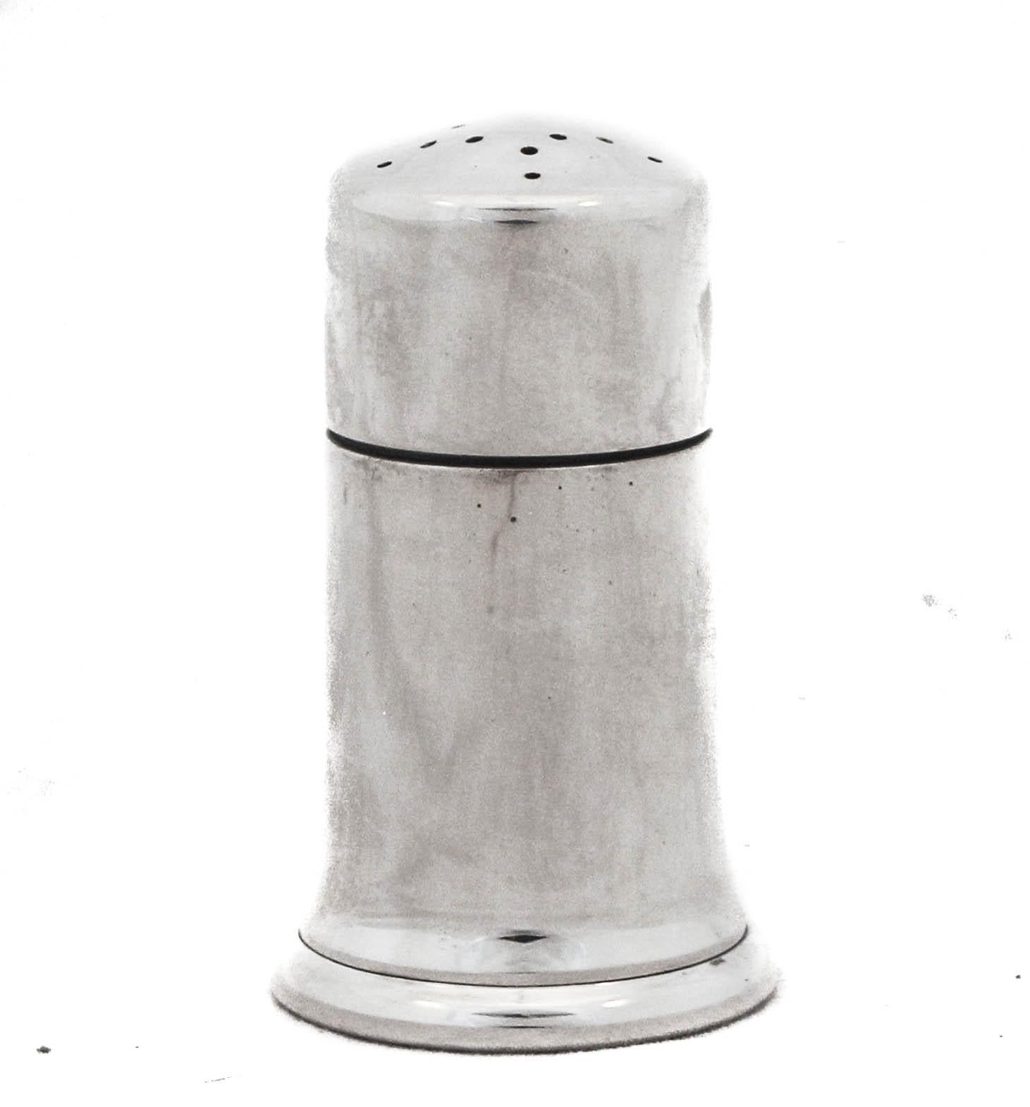 Being offered is a set of Mid-Century sterling silver salt shakers. True to the Mid-Century style of less-is-more, these shakers are simple and unadorned; no etchings or decoration. They are heavy and have a good gauge. 
 