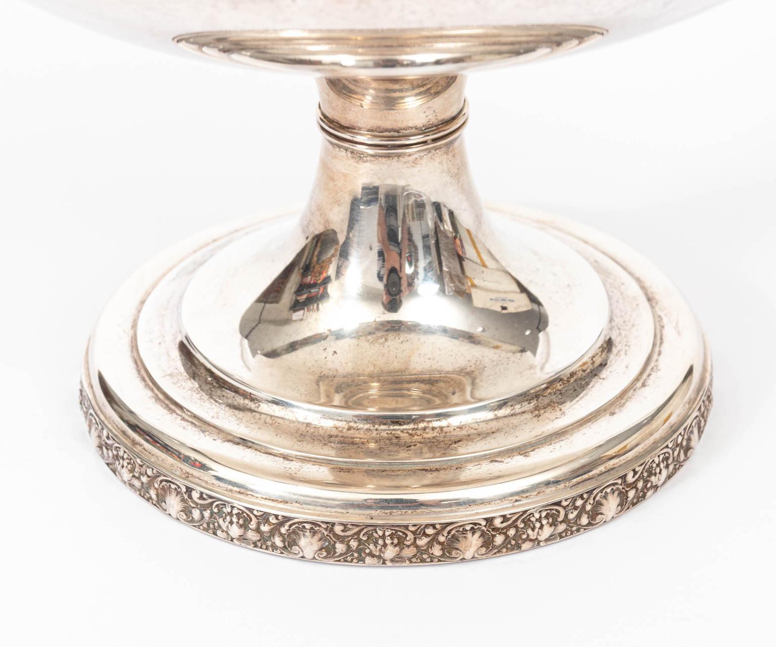 Ice bowl by Tiffany & Co. made in the early part of the 20th century, circa 1907-1930. It measures 7.75 inches wide, 5.5 inches high, 7.75 inches depth, and 4.00 inches at the base. It weighs 553.3 grams. This Ice bowl features decorative trim