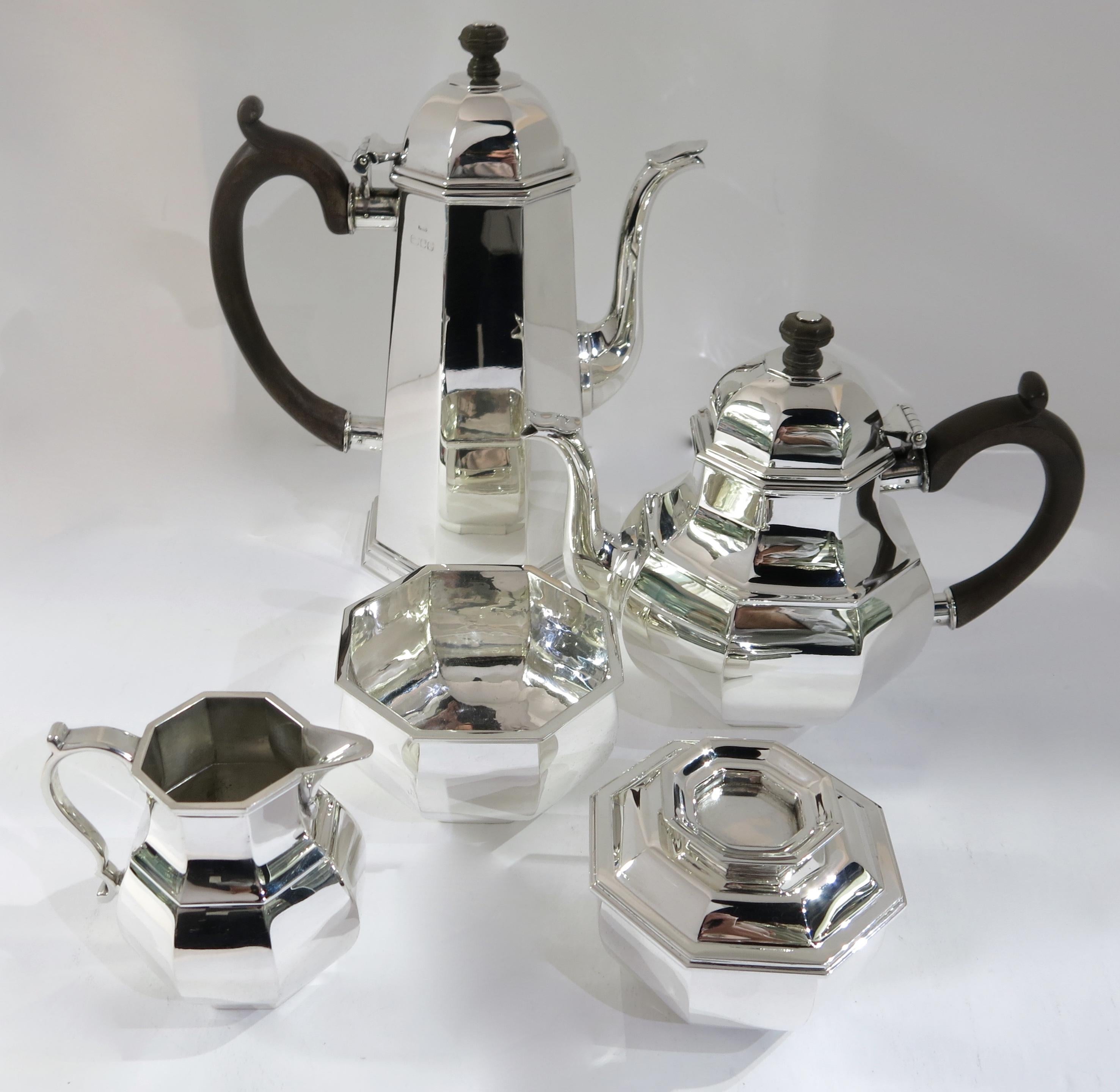 Sterling silver 5 pieces, octagonal hand forged tea and coffee set, custom made in England by Tiffany & Co. Made in London, dated 1982.
Each piece is fully hallmarked.
Set weighs 2, 750 grams. The coffee pot stands 10