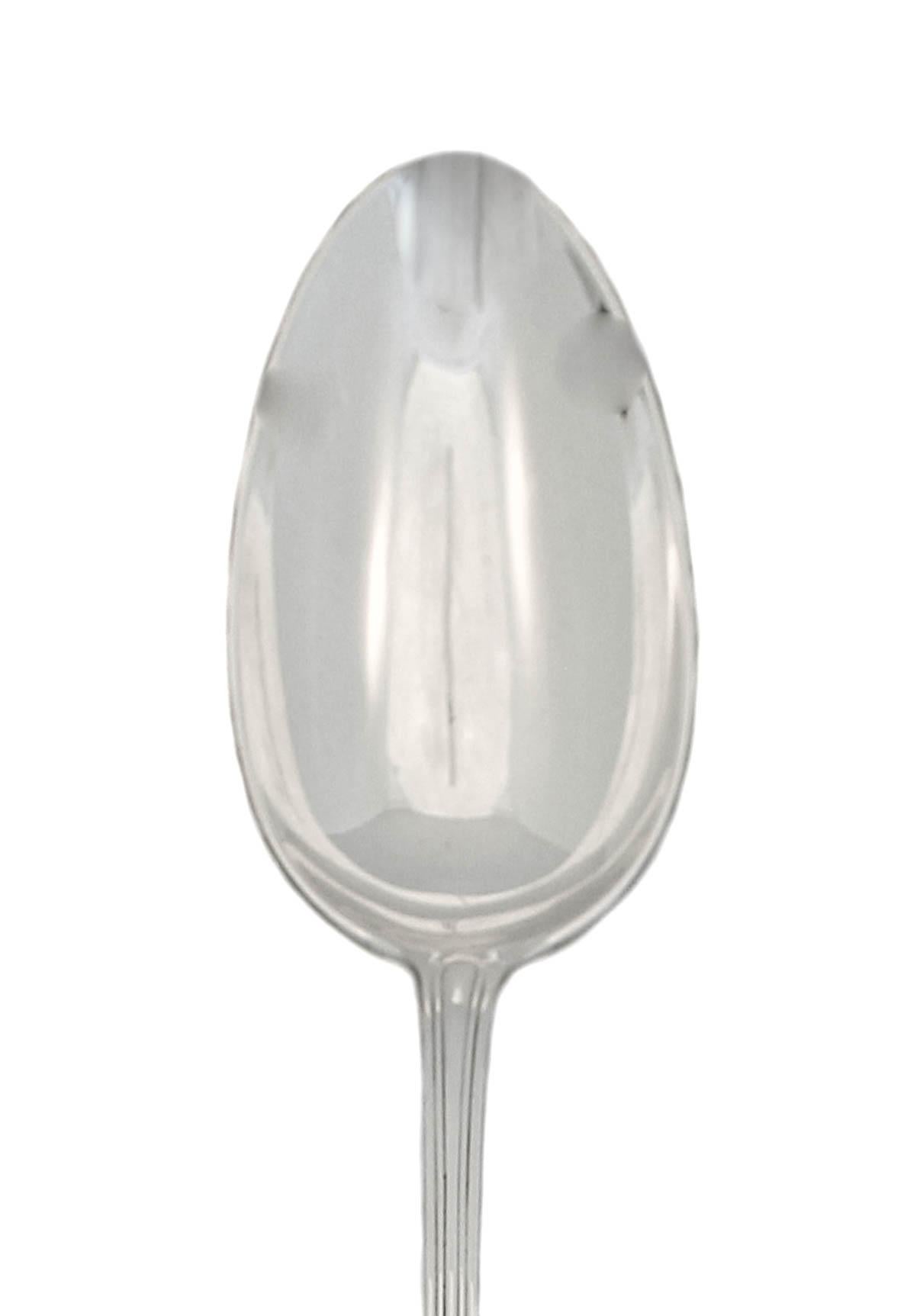 A very early and rare sterling silver platter spoon by the world renowned Tiffany & Company.  Manufactured in 1869 in the “Tiffany” pattern, it is the oldest pattern by the company.  Unlike other serving pieces, this spoon is over a foot long and