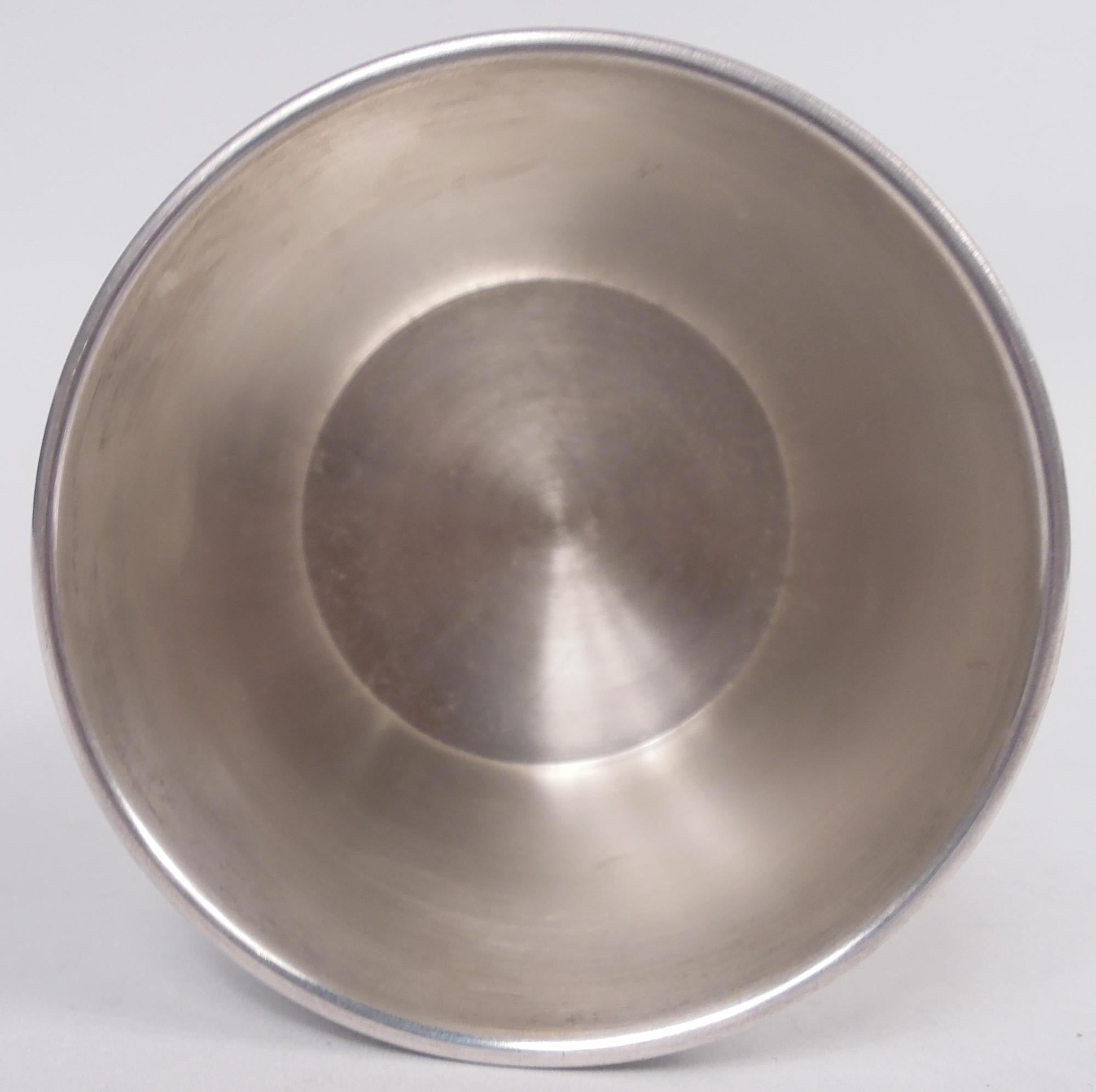 American sterling silver mint julep cup. Traditional form with tapering sides and reeded rim and base. Starter size. Marked “Tiffany & Co / Sterling / 375”. Weight: 3.3 troy ounces. 