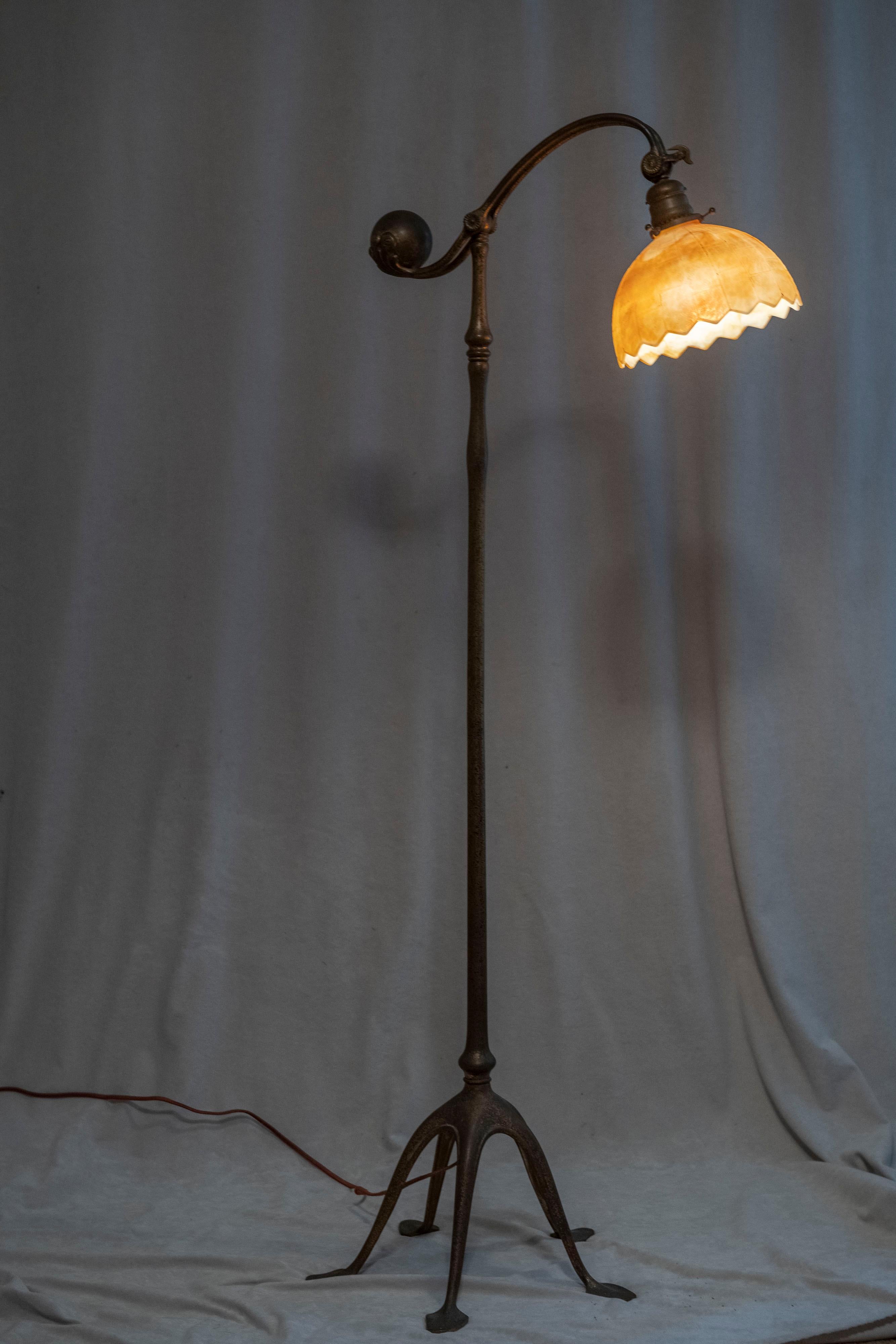  This 5 legged, counter balance signed Tiffany Studios floor lamp has the etched gilt finish with all the original parts. The shade is not Tiffany, but a really fine and appropriate size, period and color made by Kokomo Glass Company. It all makes a