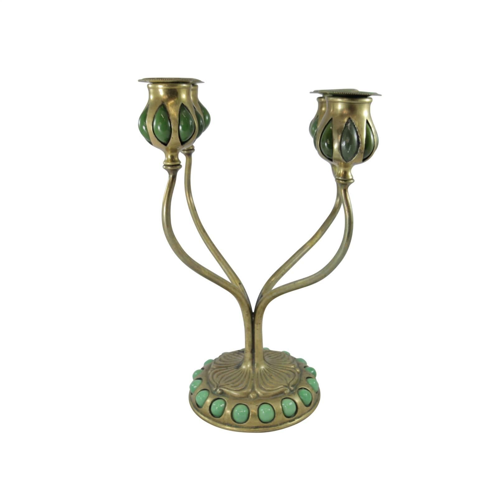 The Art Nouveau movement during the turn of the century was categorised by natural forms and structures, particularly the curved lines of plants and flowers. It's not hard to see the organic influence in this early Tiffany Studios candelabra, with