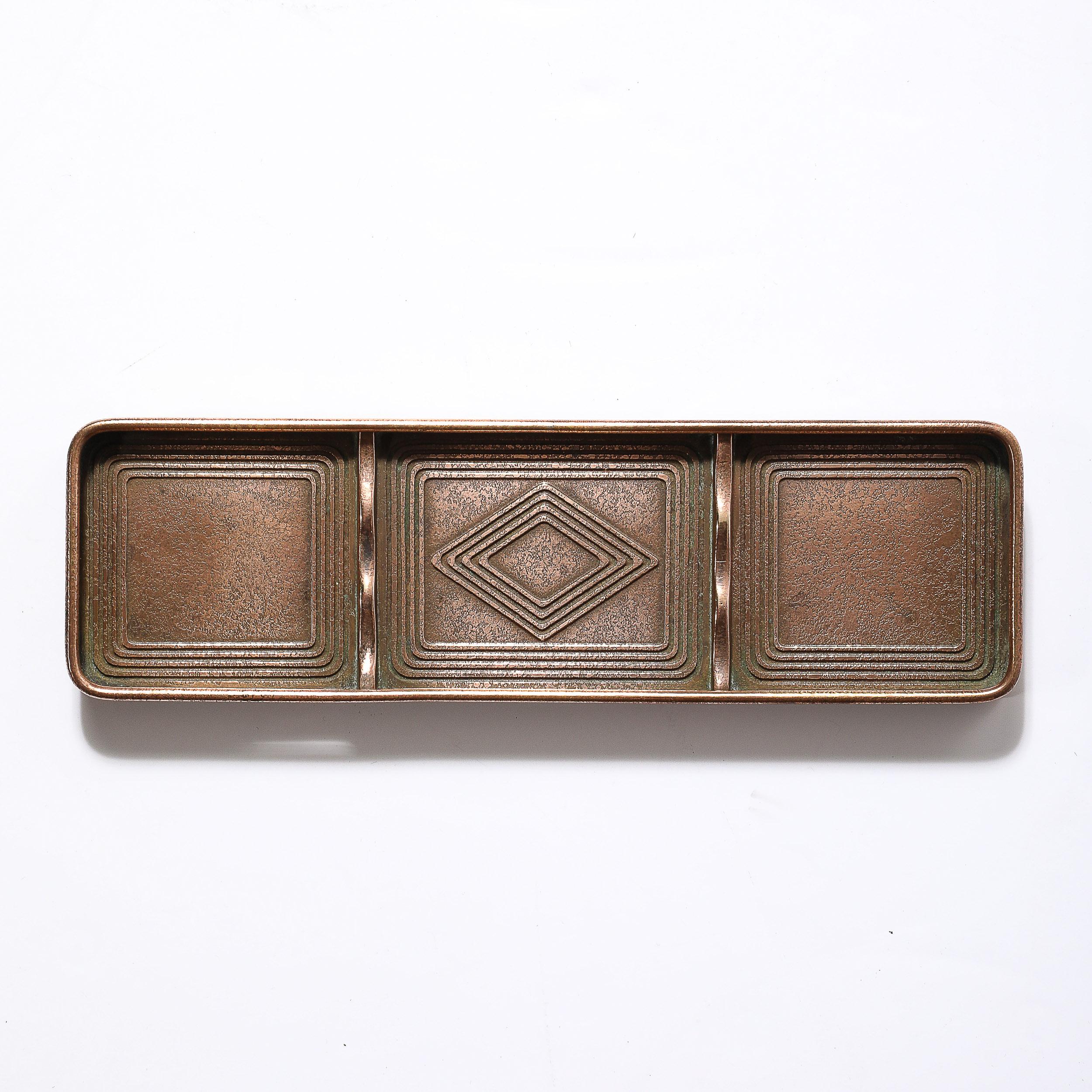This beautifully designed and crafted Tiffany Studios Bronze  Pen Holder in the Graduate Pattern originates from the United States, Circa 1910. Features a rounded rectangular profile with a rasied lip and grooved linear detailing throughout, with a