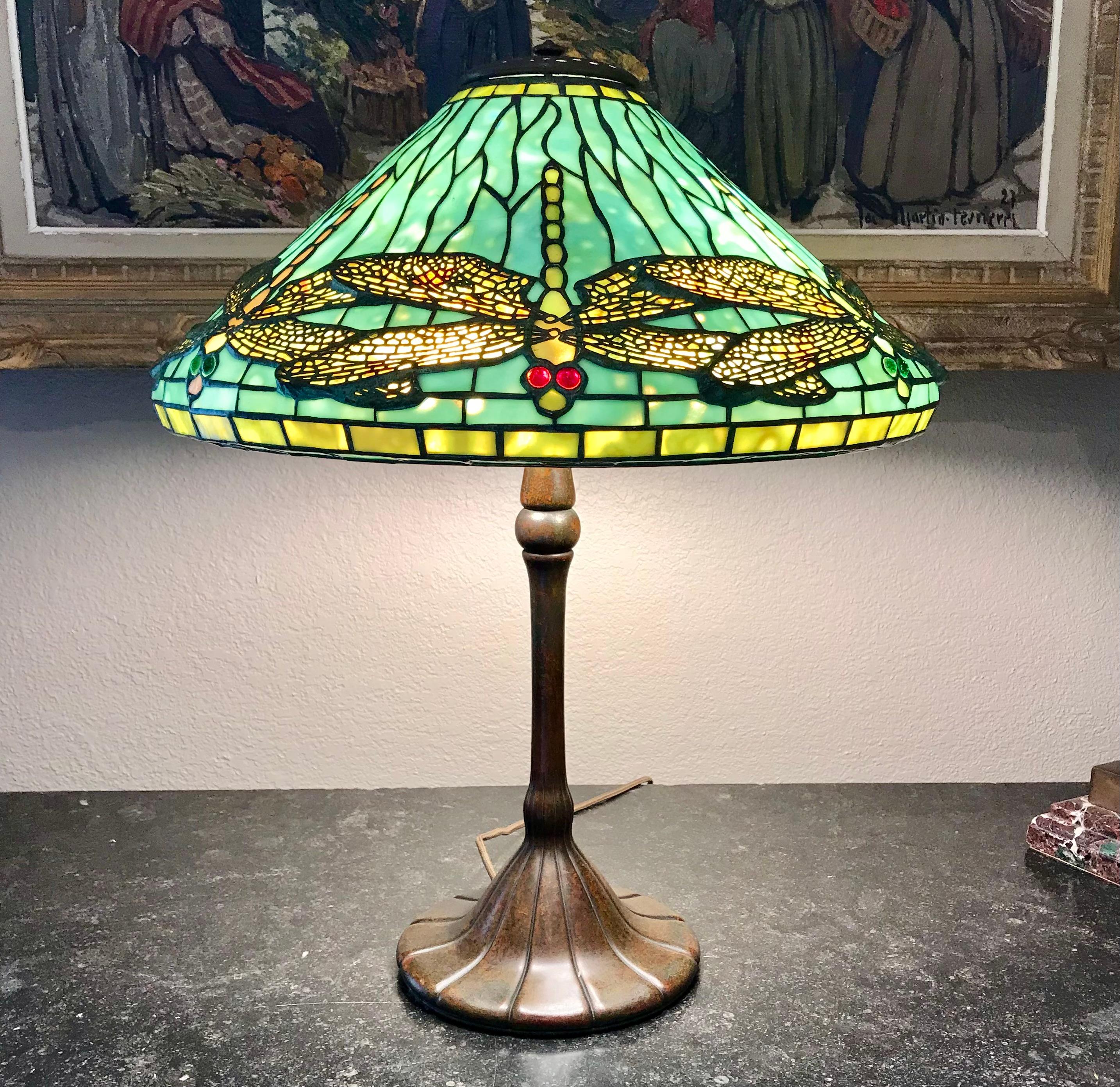 Tiffany Studios Dragonfly Table Lamp
A gorgeous Tiffany Studios diachronic light blue to green Dragonfly tanle lamp with confetti glass wings. A true piece of Museum quality collection for the discernible buyer.
Circa 1915. New York, NY. USA
Leaded