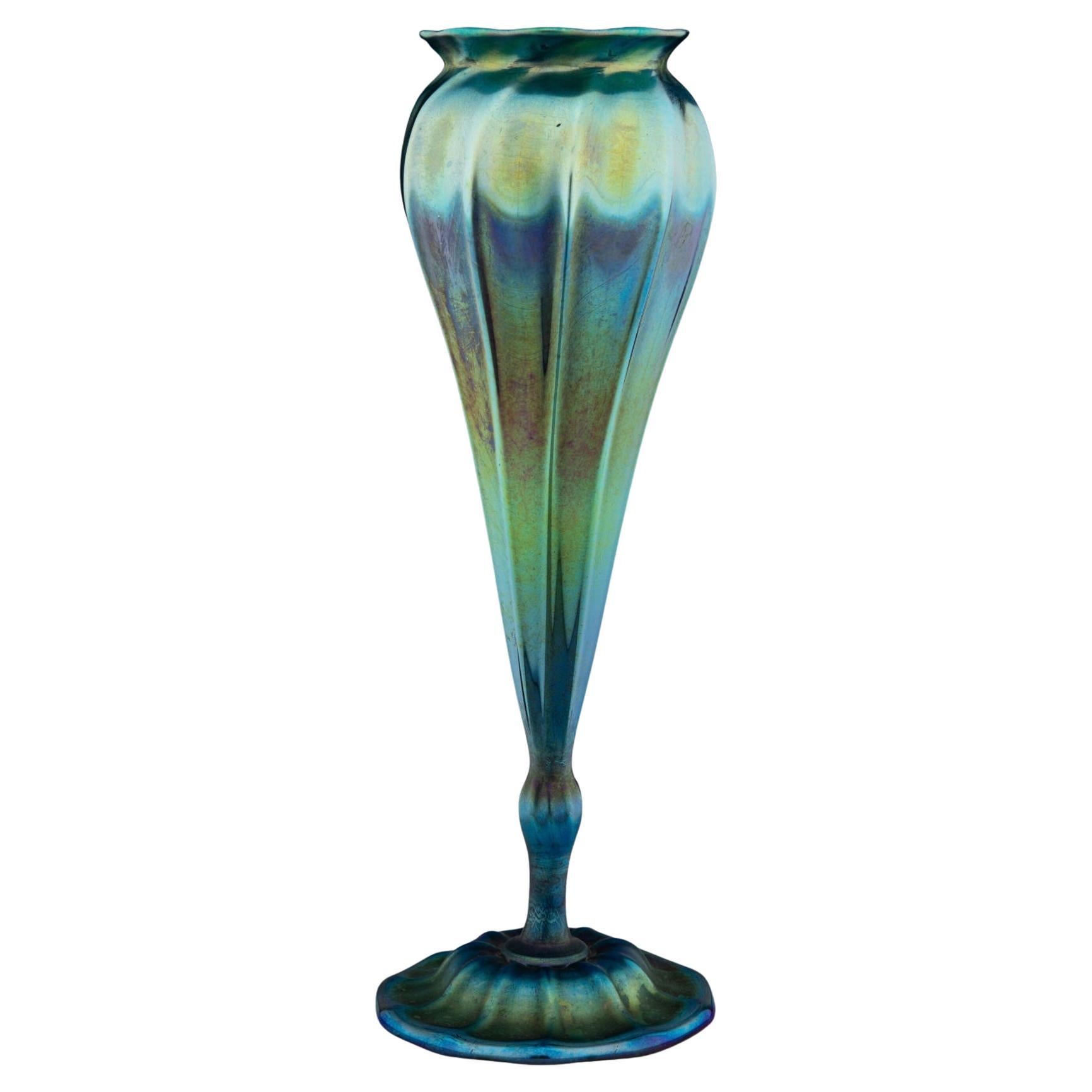 What is Louis Comfort Tiffany most famous for producing?
