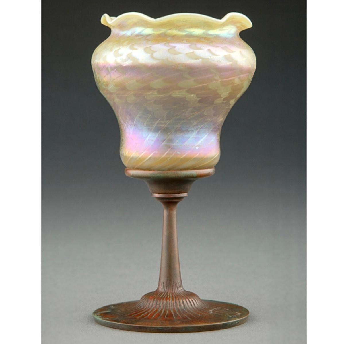 Tiffany studios Favrile Damascene glass and bronze vase, Art Nouveau circa 1900

A very rare and early Tiffany Studios Damascene favrile glass and bronze cup or decorated vase. I have been collecting and selling STNY items for over 20 years and have