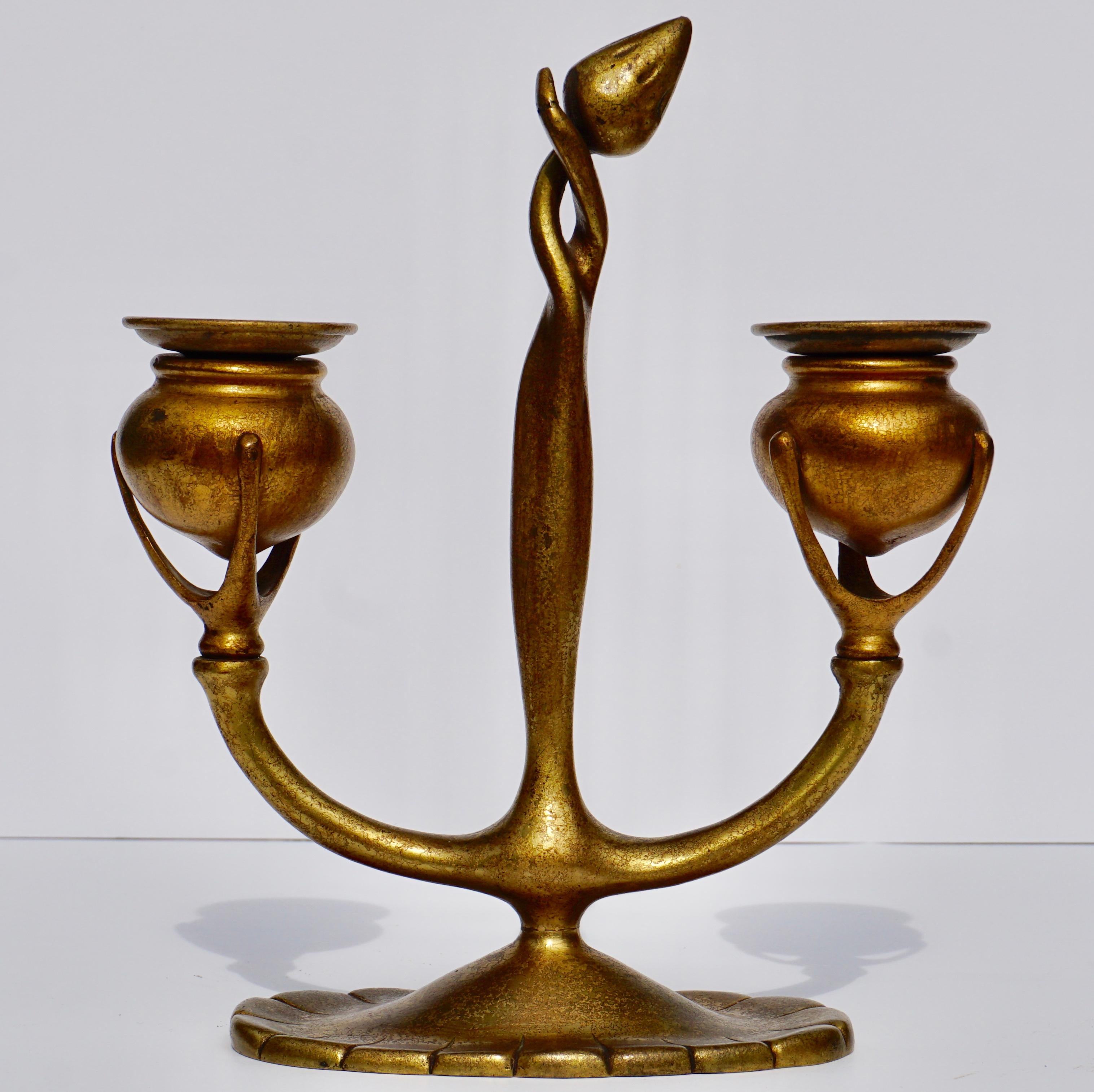 Tiffany studios fleur-de-lis candelabrum, New York, early 20th century
Art Nouveau design
Acid-etched gilt bronze with gold patina.
Stamped: Tiffany Studios/NEW YORK 1230 with Tiffany Studios cipher

Measures: Height 8.8 inches
Width 7.5