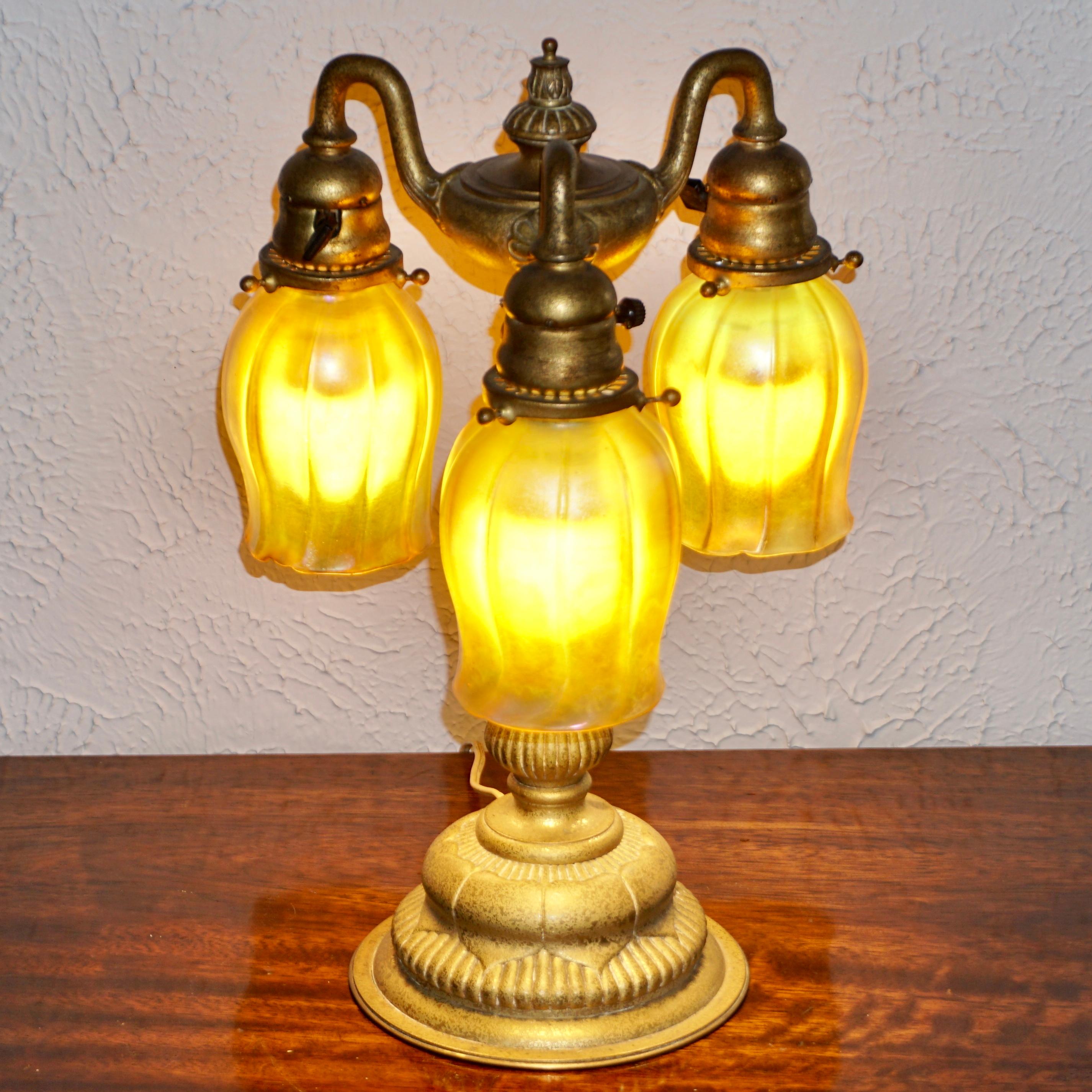 Tiffany Studios Gilt Bronze Three Light Favrile Table Lamp In Excellent Condition In Dallas, TX