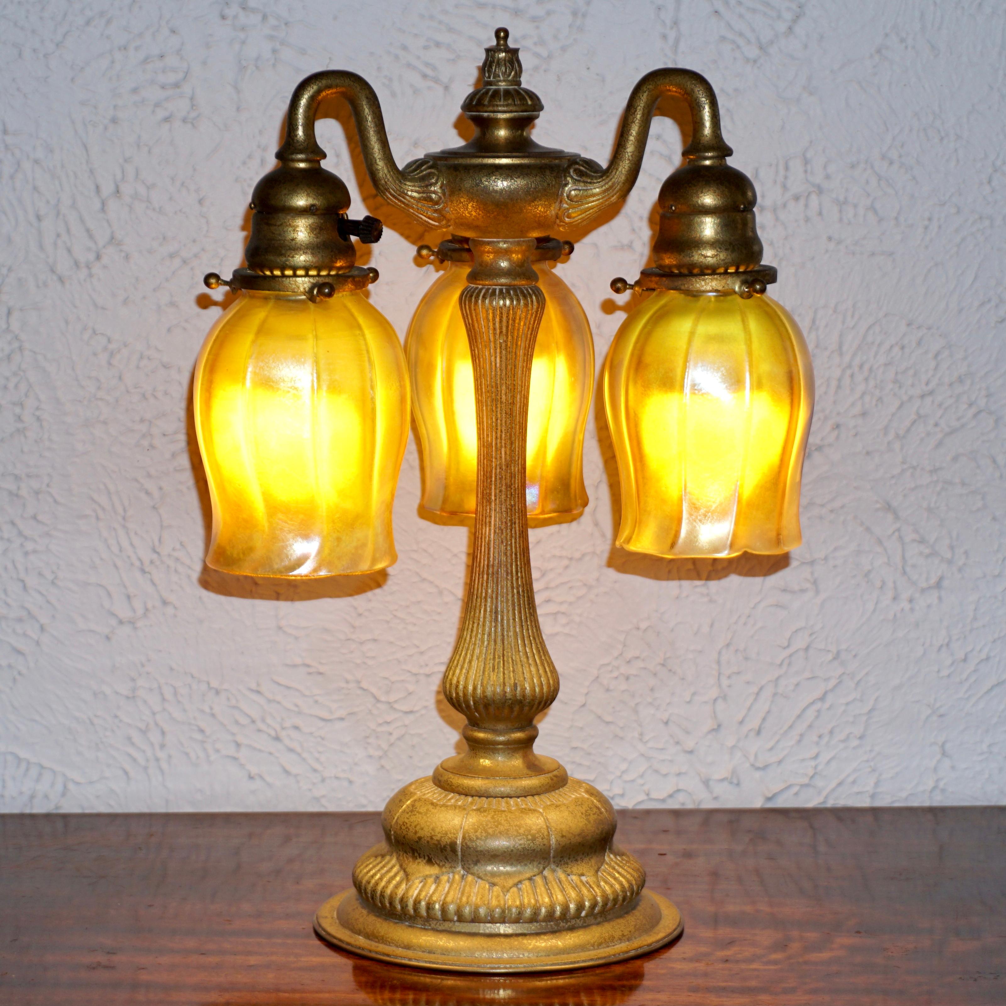 Early 20th Century Tiffany Studios Gilt Bronze Three Light Favrile Table Lamp