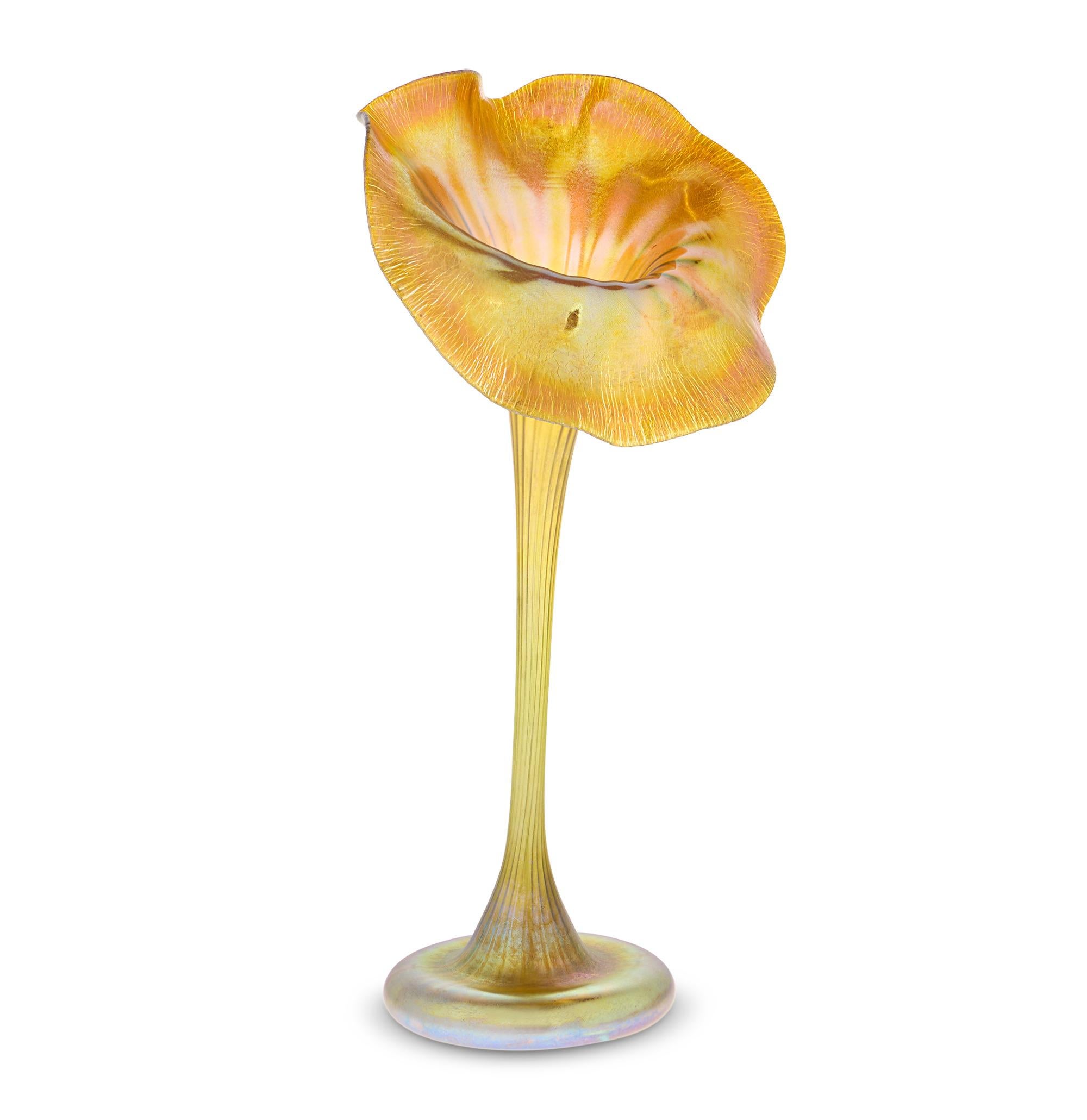 This exceptionally rare Jack-in-the-pulpit Favrile glass vase by Tiffany Studios displays one of the company’s best-known and most popular Art Nouveau designs. This extraordinarily elegant vase was one of the hallmarks of Tiffany's decorative glass,