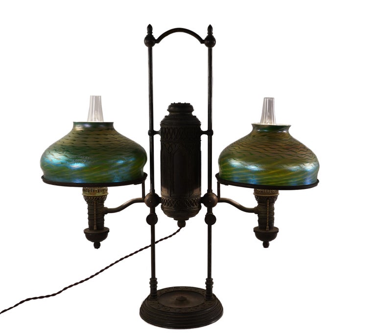 Attributed to Tiffany Studios lamp base with Favrille shades

Measures: Height: 29