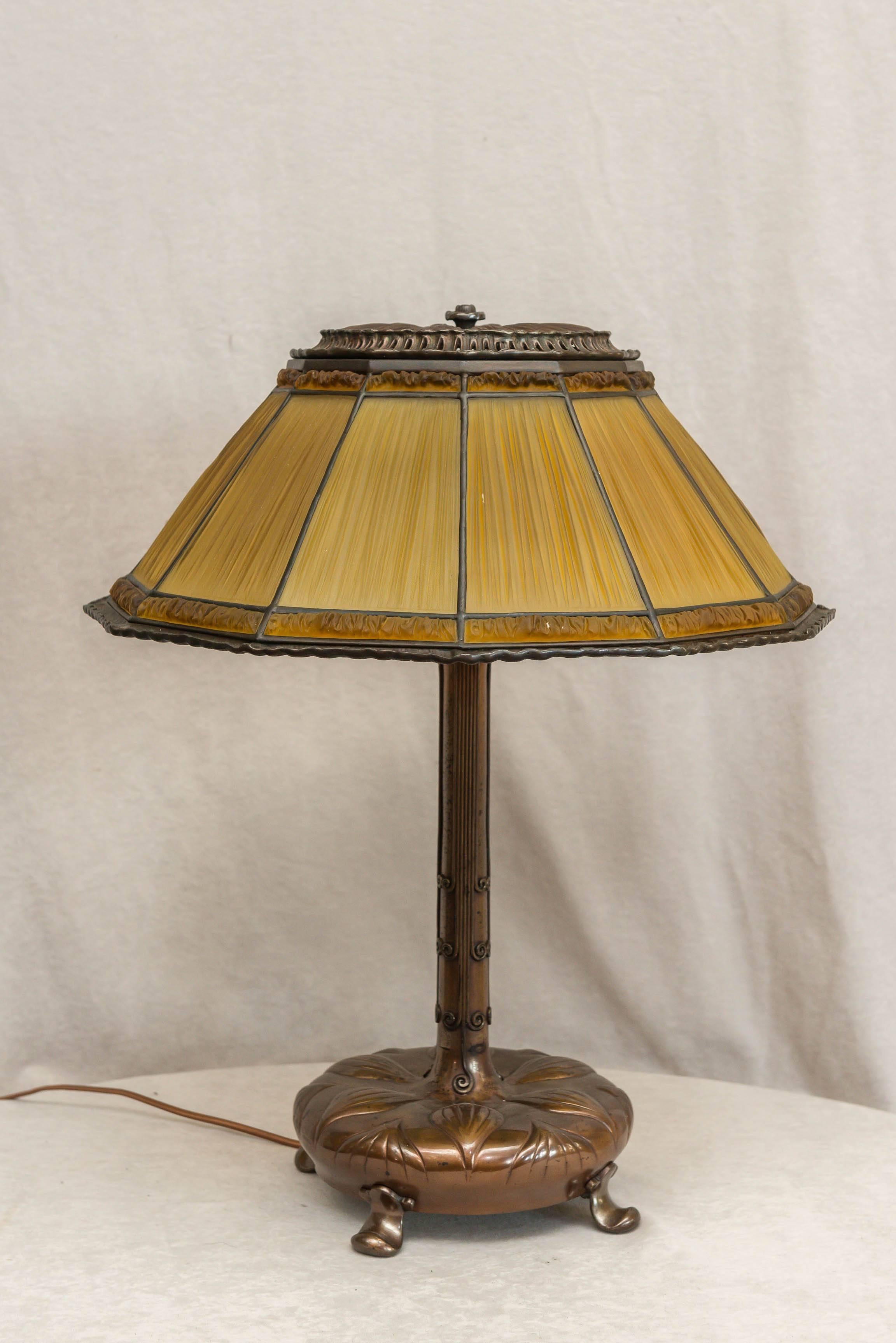 We only sell original period Tiffany Studios lamps, and the linenfold style shades have been our most popular design. Originally meant to go with French furniture with it's elegant and clean look, it has now been used with any furniture from any