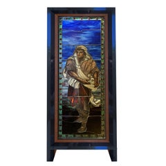 Ventana fiqural de vidrio artístico emplomado de los Estudios Tiffany