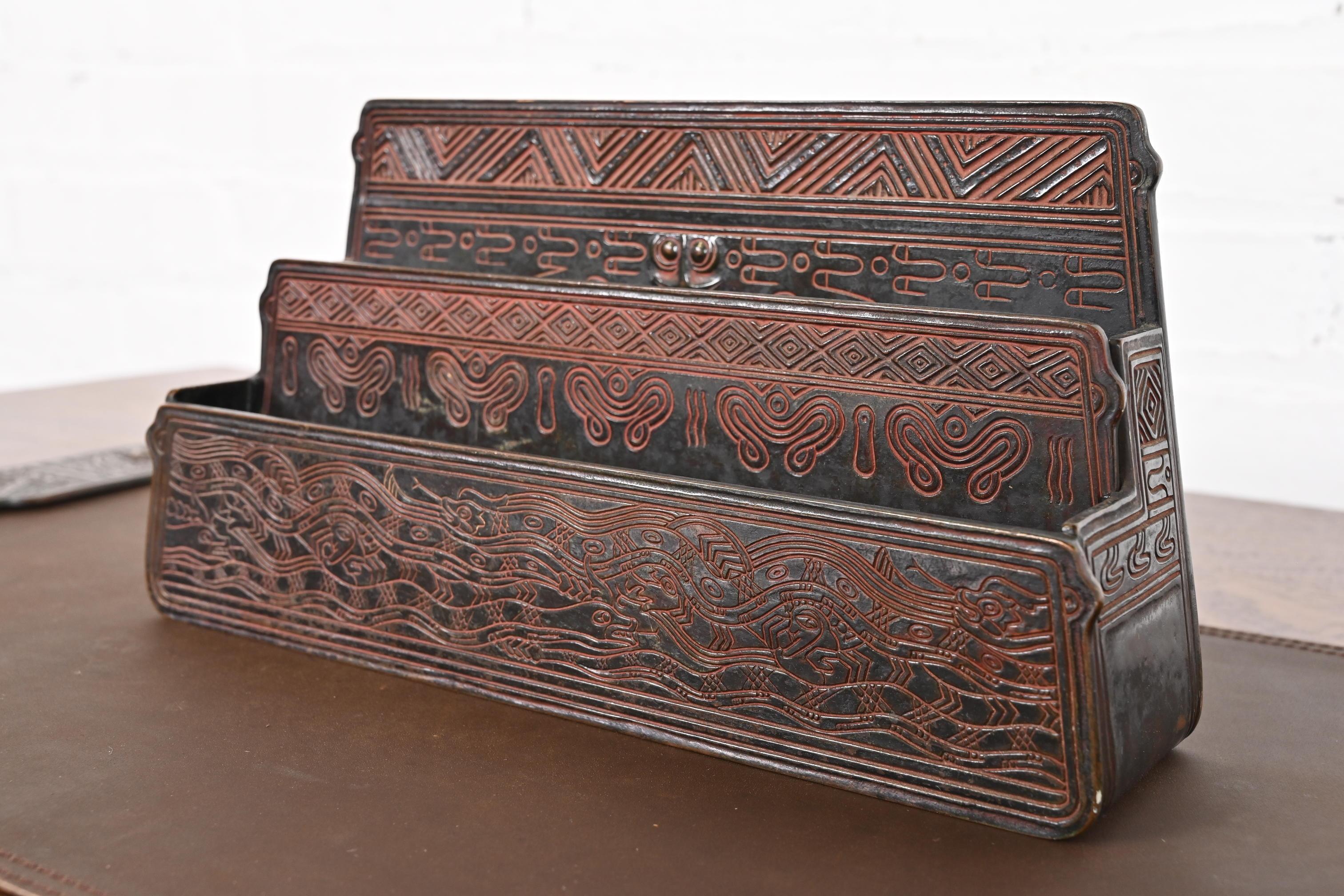 A gorgeous Art Deco or Arts & Crafts period patinated bronze letter rack in the 