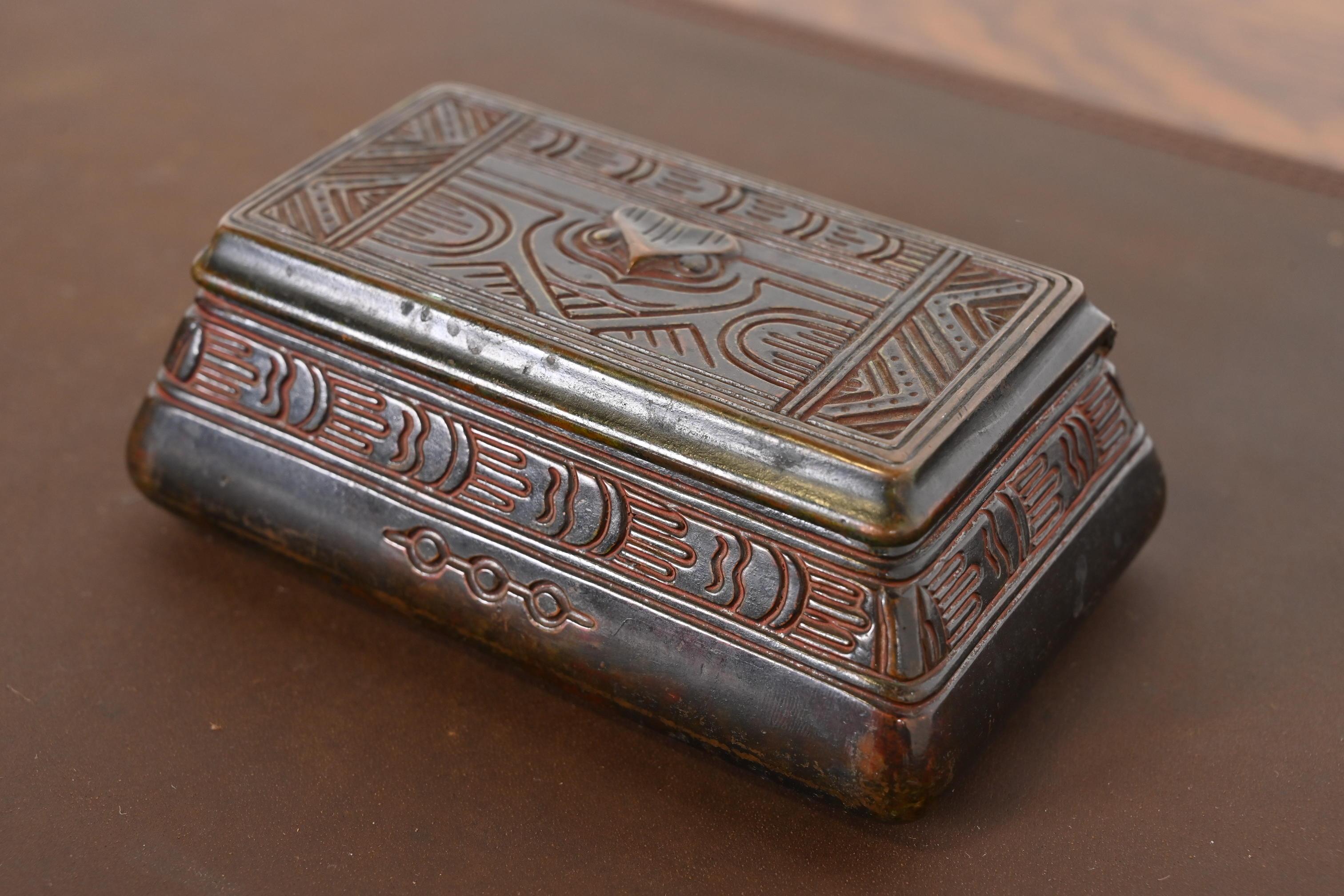A gorgeous Art Deco or Arts & Crafts period patinated bronze stamp box, jewelry box, or desk box in the 