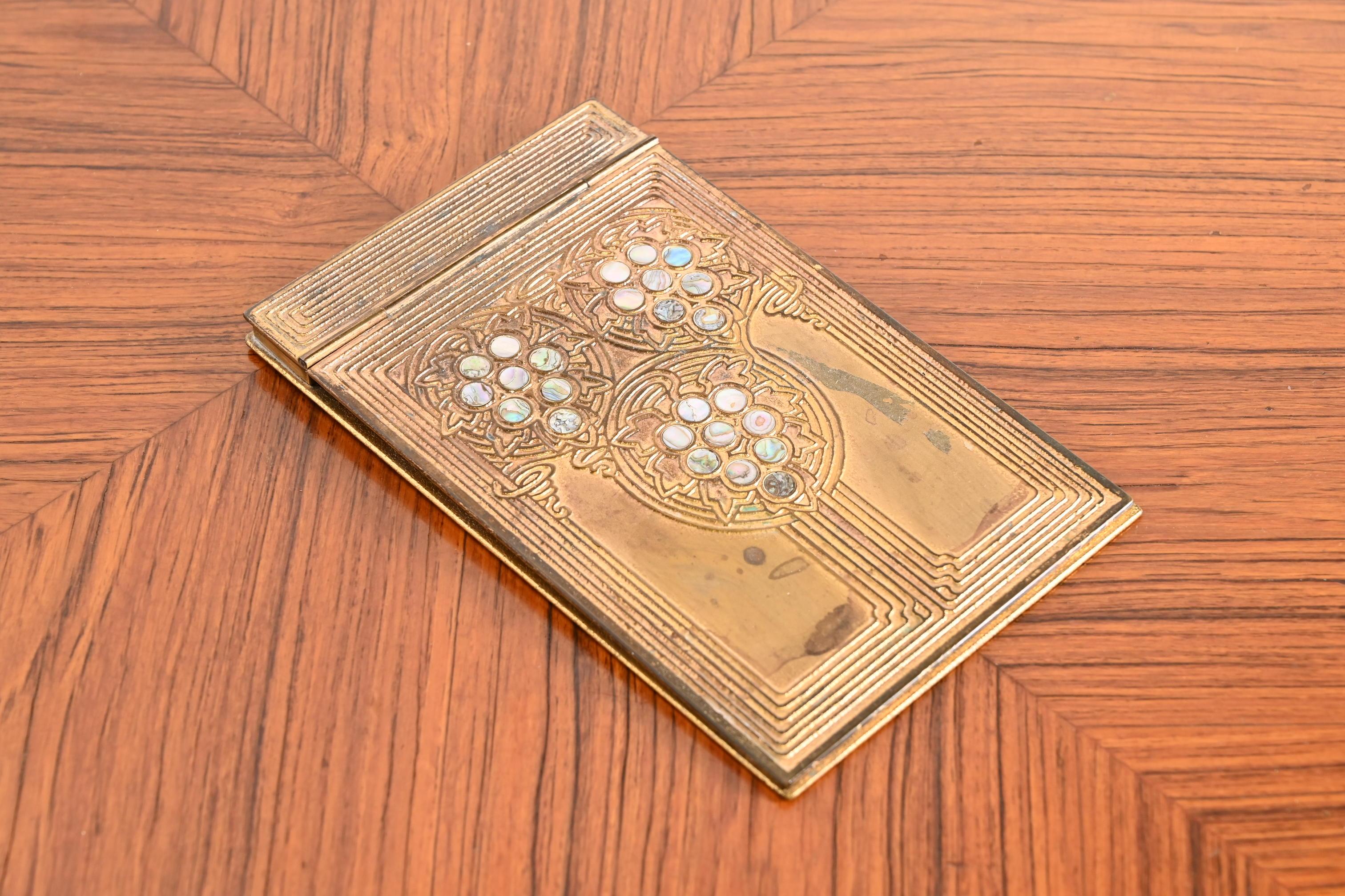 Tiffany Studios New York Art Deco Bronze Doré and Inlaid Abalone Notepad Holder In Good Condition For Sale In South Bend, IN