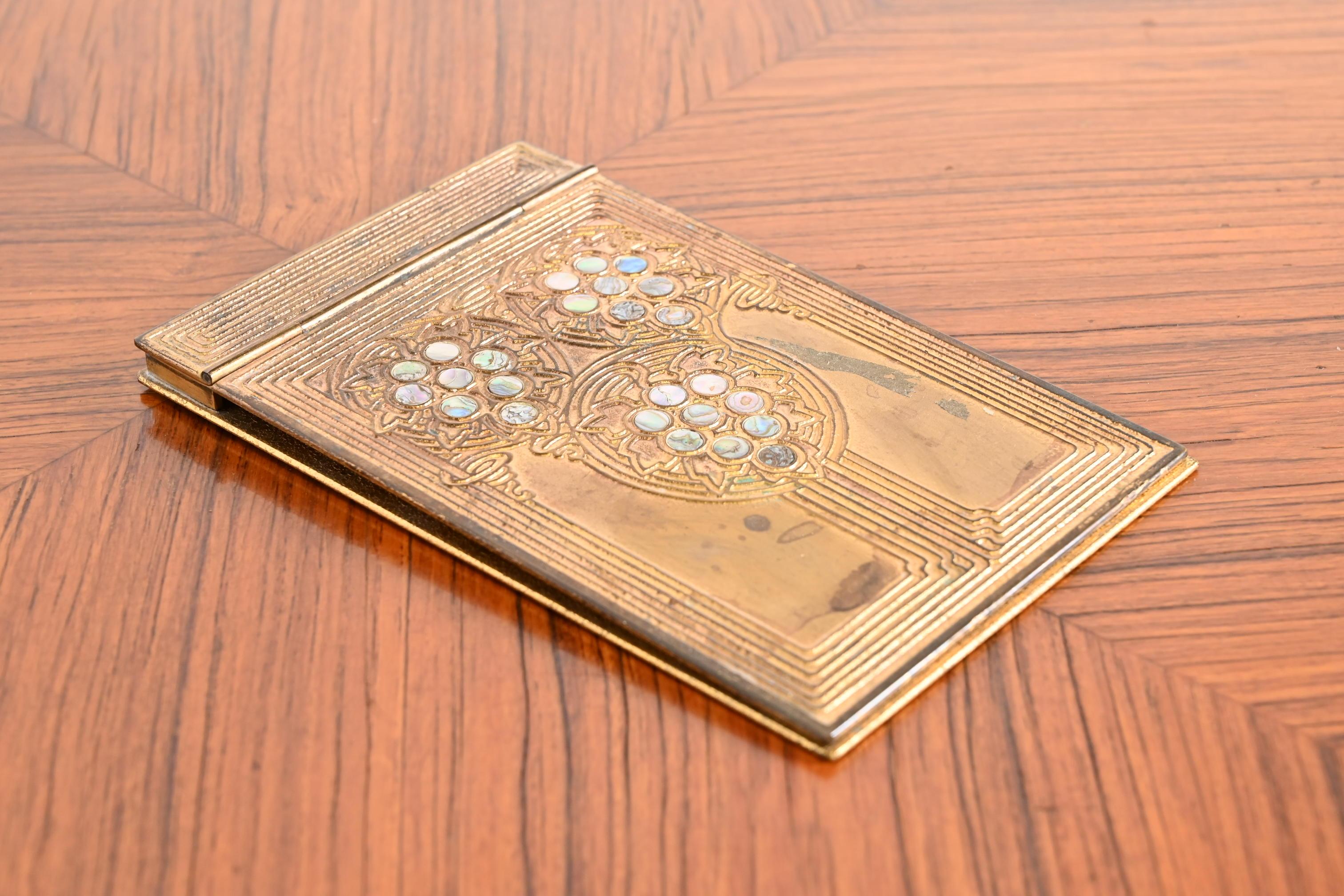 20th Century Tiffany Studios New York Art Deco Bronze Doré and Inlaid Abalone Notepad Holder For Sale
