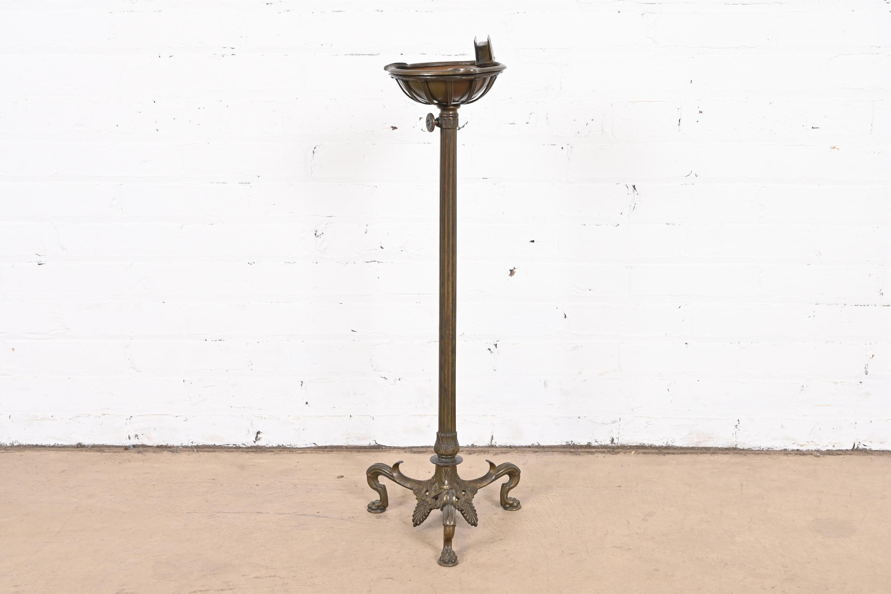 A gorgeous Art Deco period sculpted bronze ash stand

By Tiffany Studios

New York, USA, Early 20th Century

Measures: 9