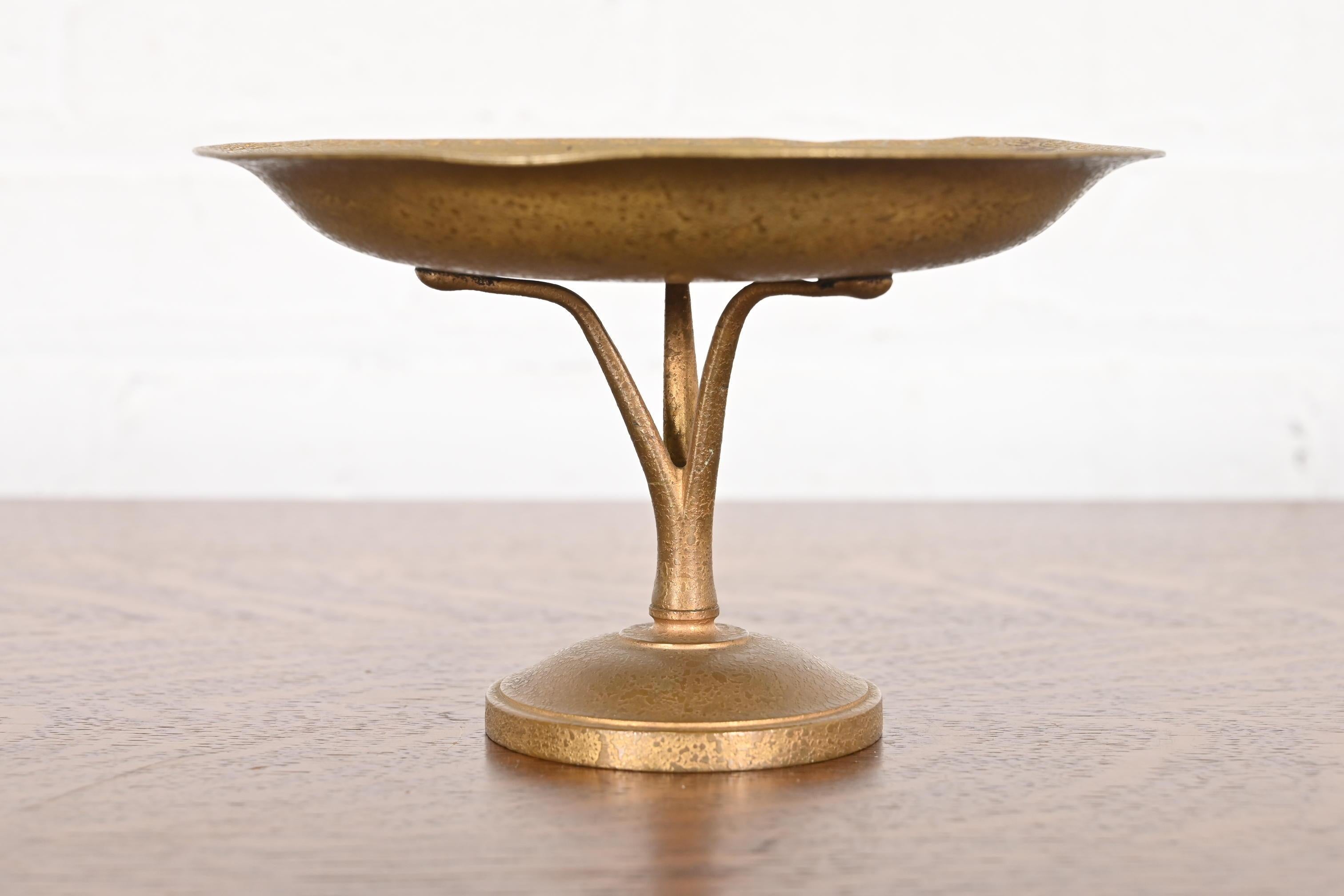 A gorgeous Arts & Crafts period gilt bronze pedestal bowl or compote dish

By Tiffany Studios (signed to the underside)

New York, USA, Early 20th Century

Measures: 7