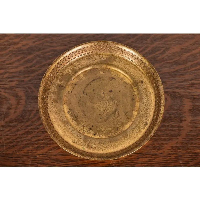 A gorgeous Arts & Crafts or Art Deco period gilt bronze shallow bowl or tray with decorative border

By Tiffany Studios (signed to the underside)

New York, USA, Early 20th Century

Measures: 7.25