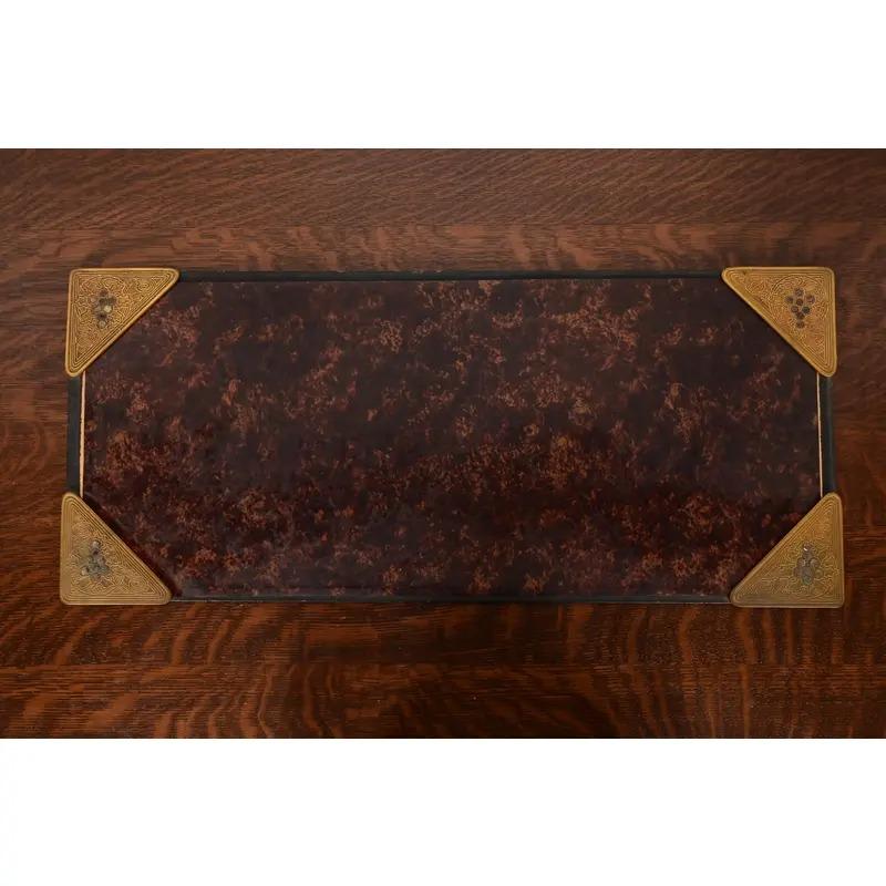 A gorgeous set of four Art Deco or Arts & Crafts period gilt bronze and abalone blotter corners, with a faux tortoise shell desk blotter.

By Tiffany Studios (blotter corners signed to the underside)

New York, USA, Early 20th Century

Each
