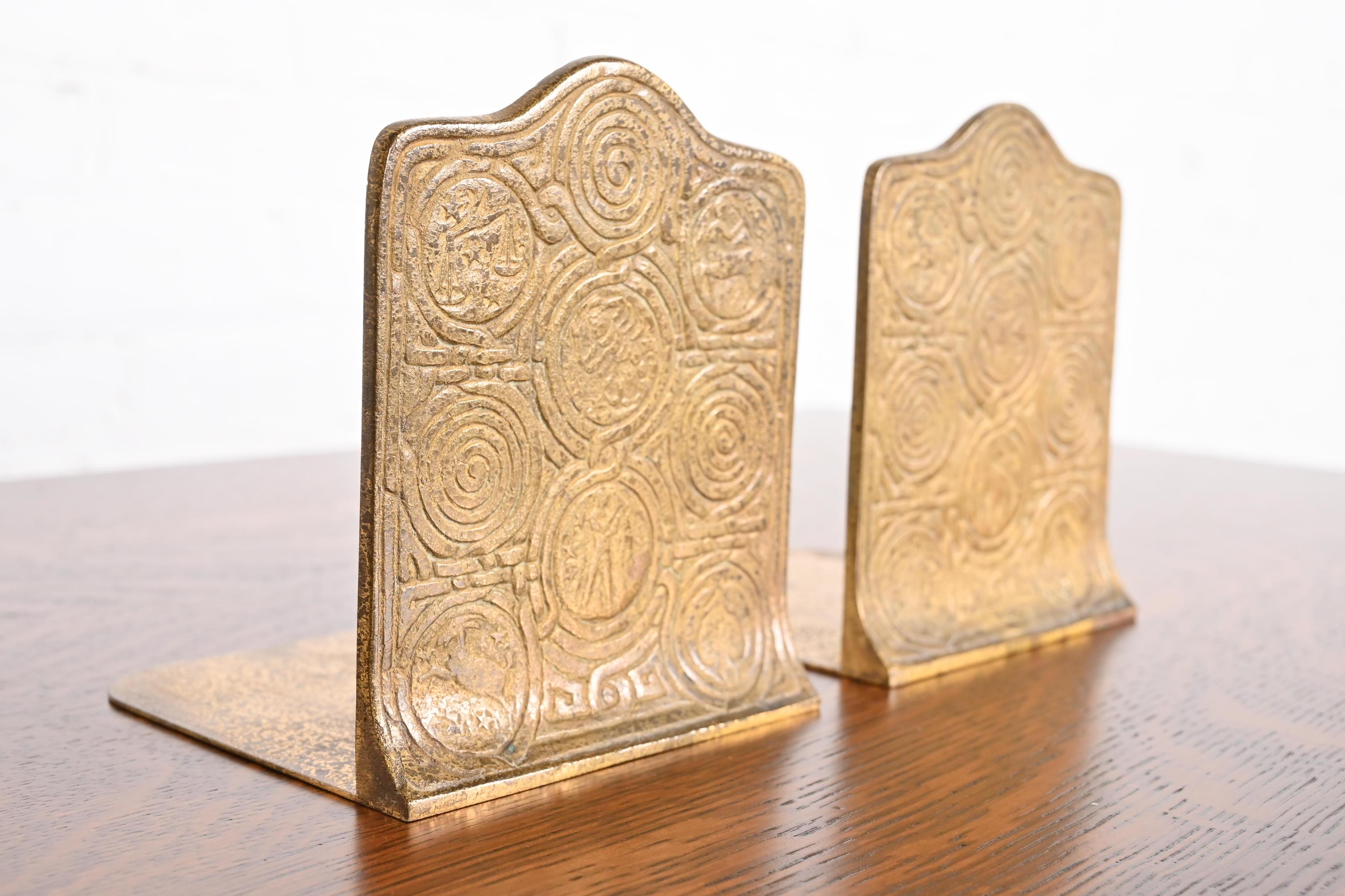 Gilt Tiffany Studios New York Bronze Doré Zodiac Bookends, Circa 1910 For Sale