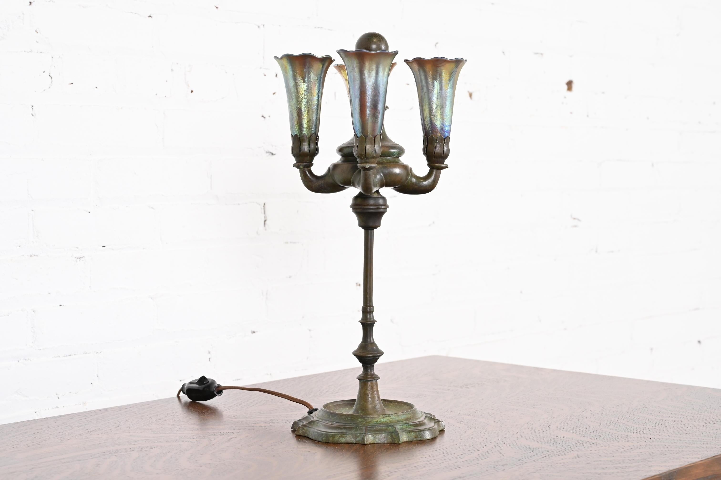 American Tiffany Studios New York Bronze Four-Light Table Lamp With Favrile Glass Shades