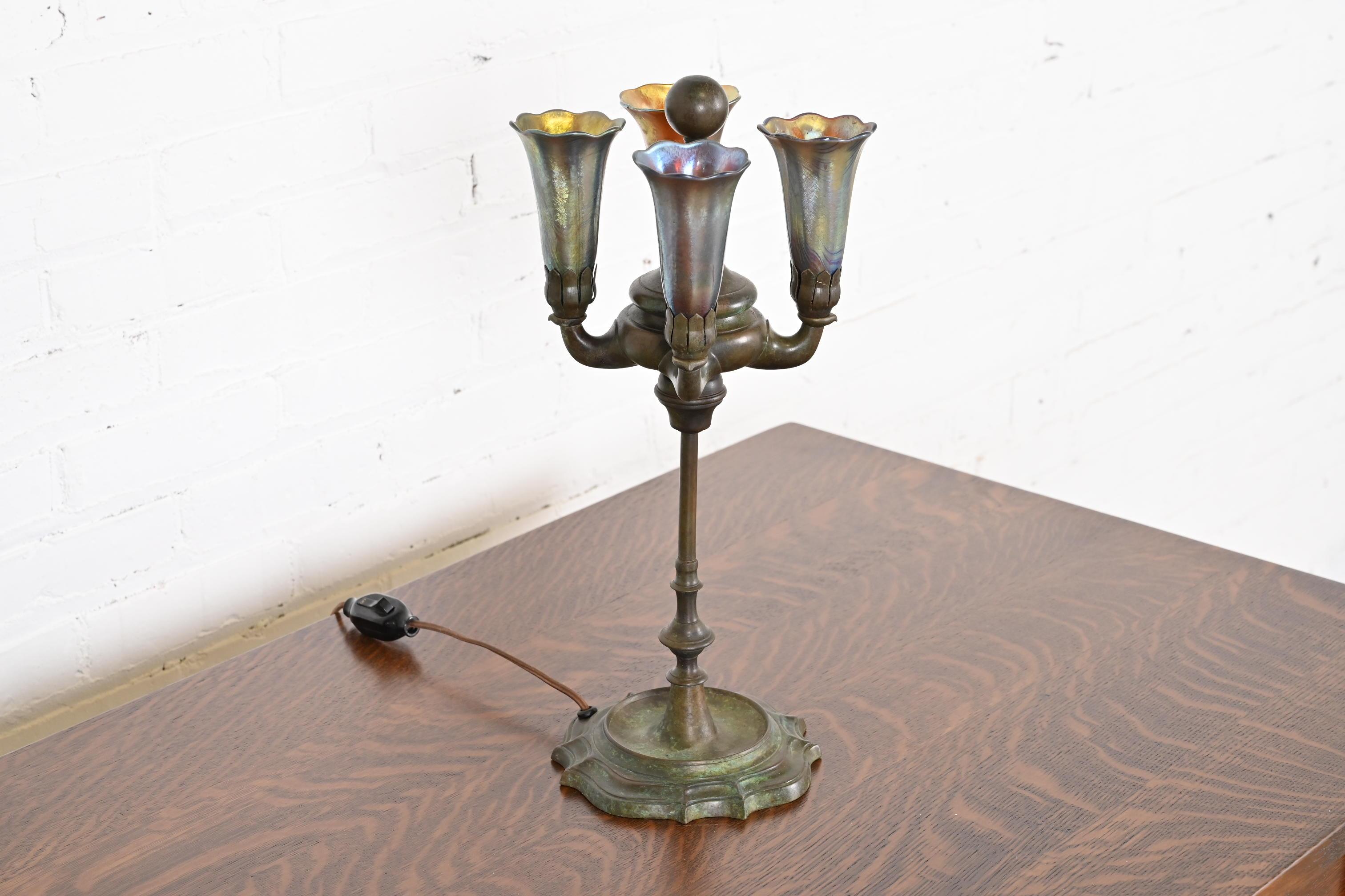 Tiffany Studios New York Bronze Four-Light Table Lamp With Favrile Glass Shades In Good Condition In South Bend, IN