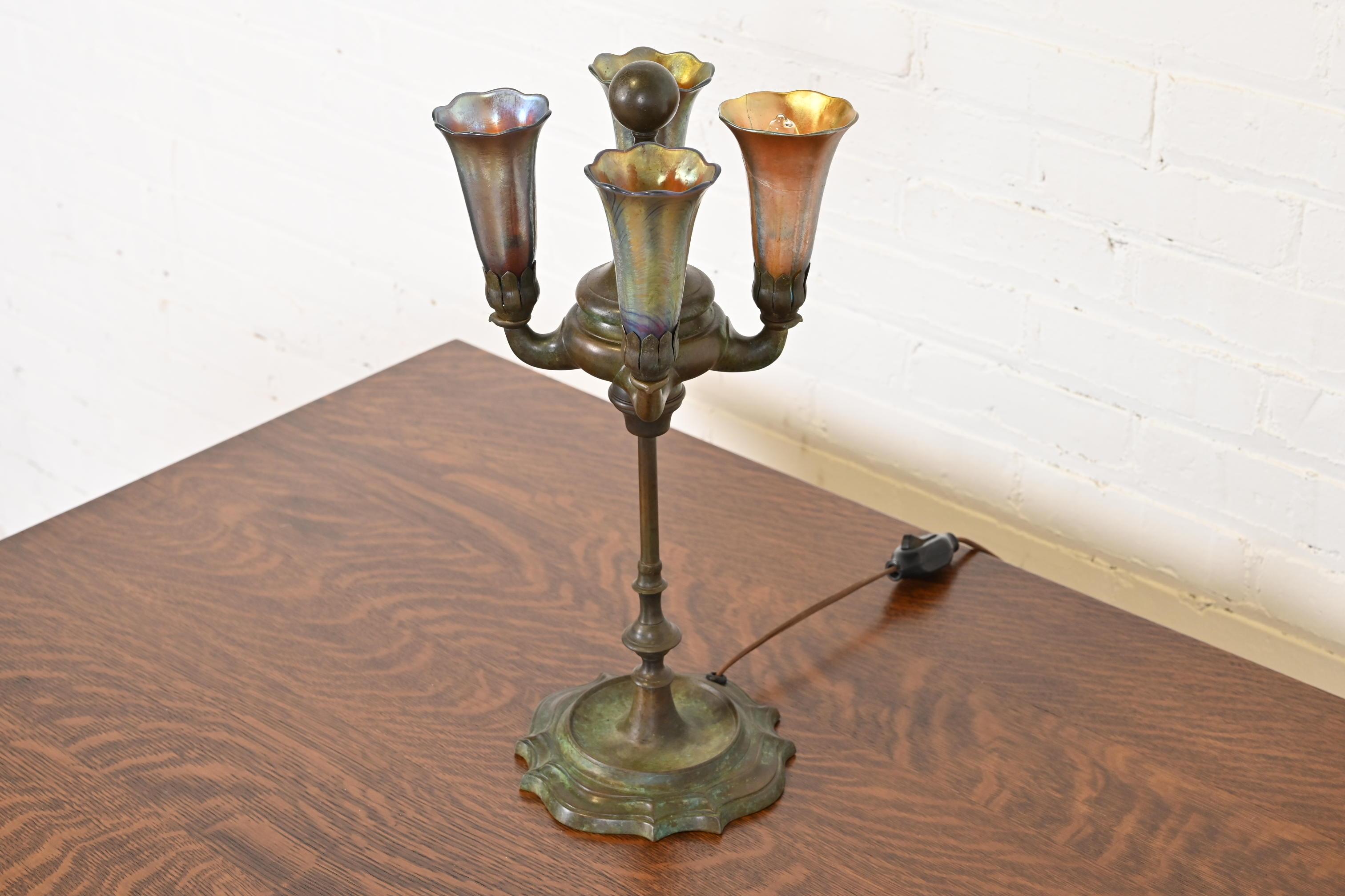 20th Century Tiffany Studios New York Bronze Four-Light Table Lamp With Favrile Glass Shades