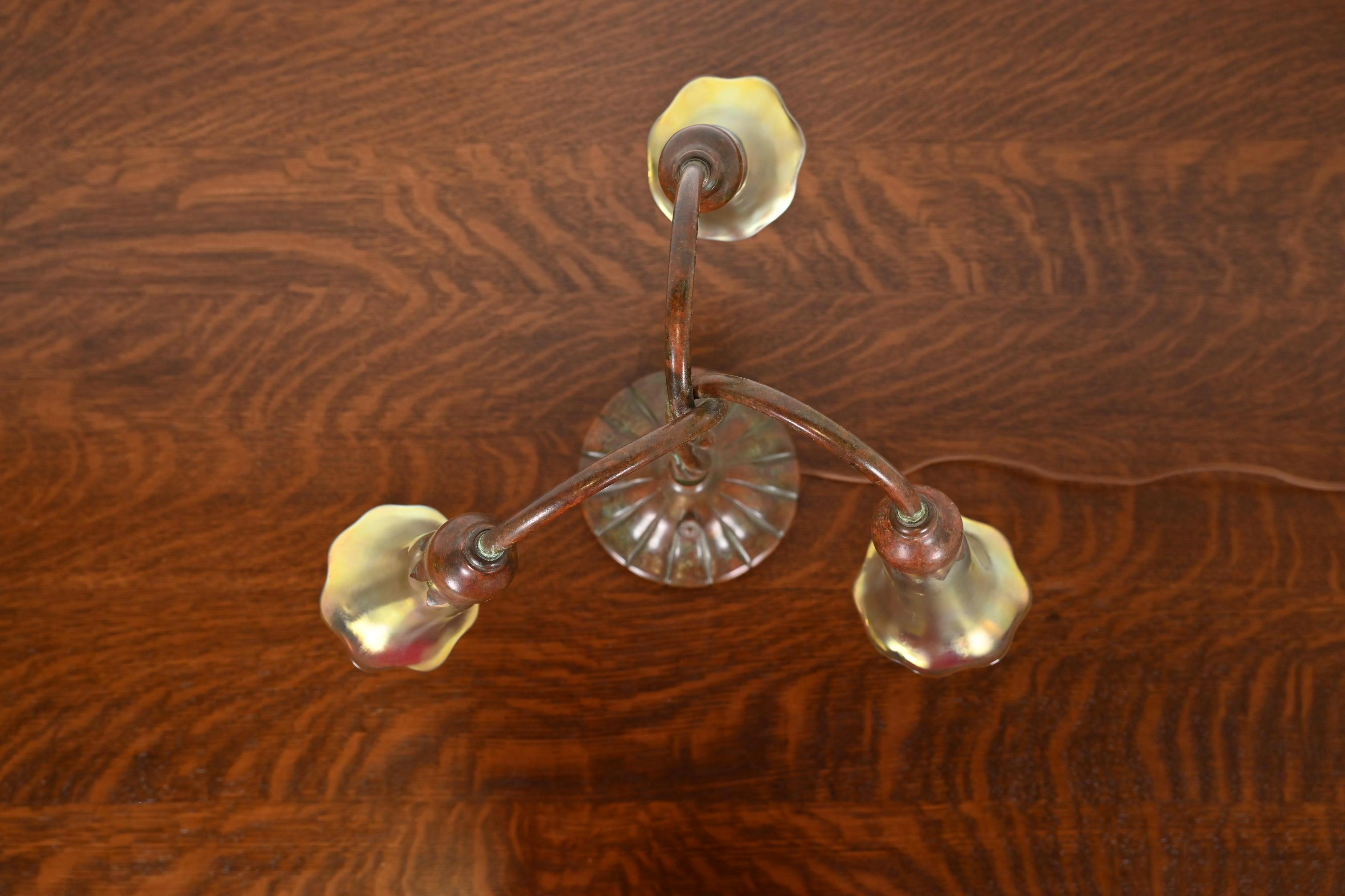 American Tiffany Studios New York Bronze Three-Light Lily Table Lamp For Sale