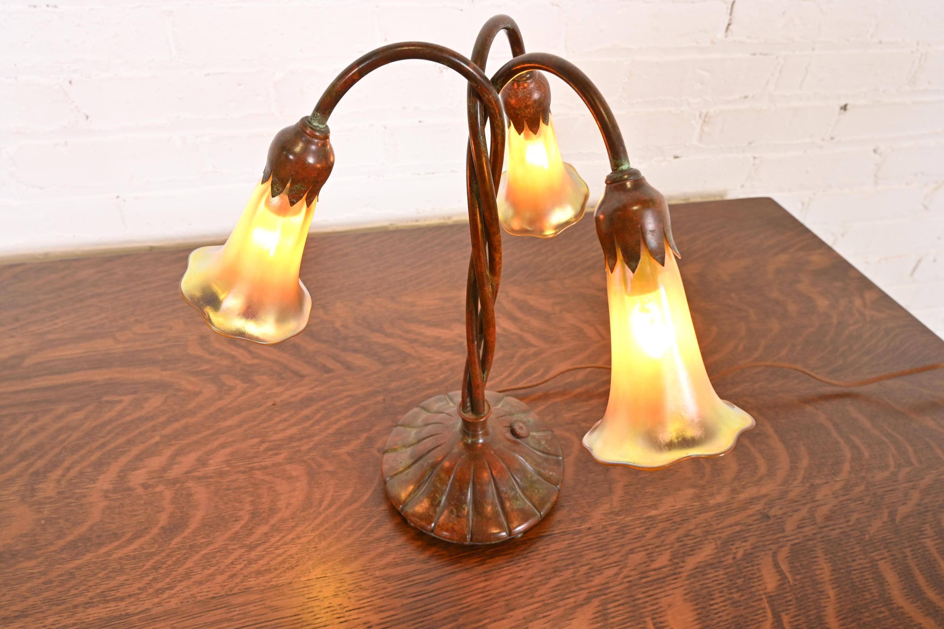 Tiffany Studios New York Bronze Three-Light Lily Table Lamp In Good Condition For Sale In South Bend, IN