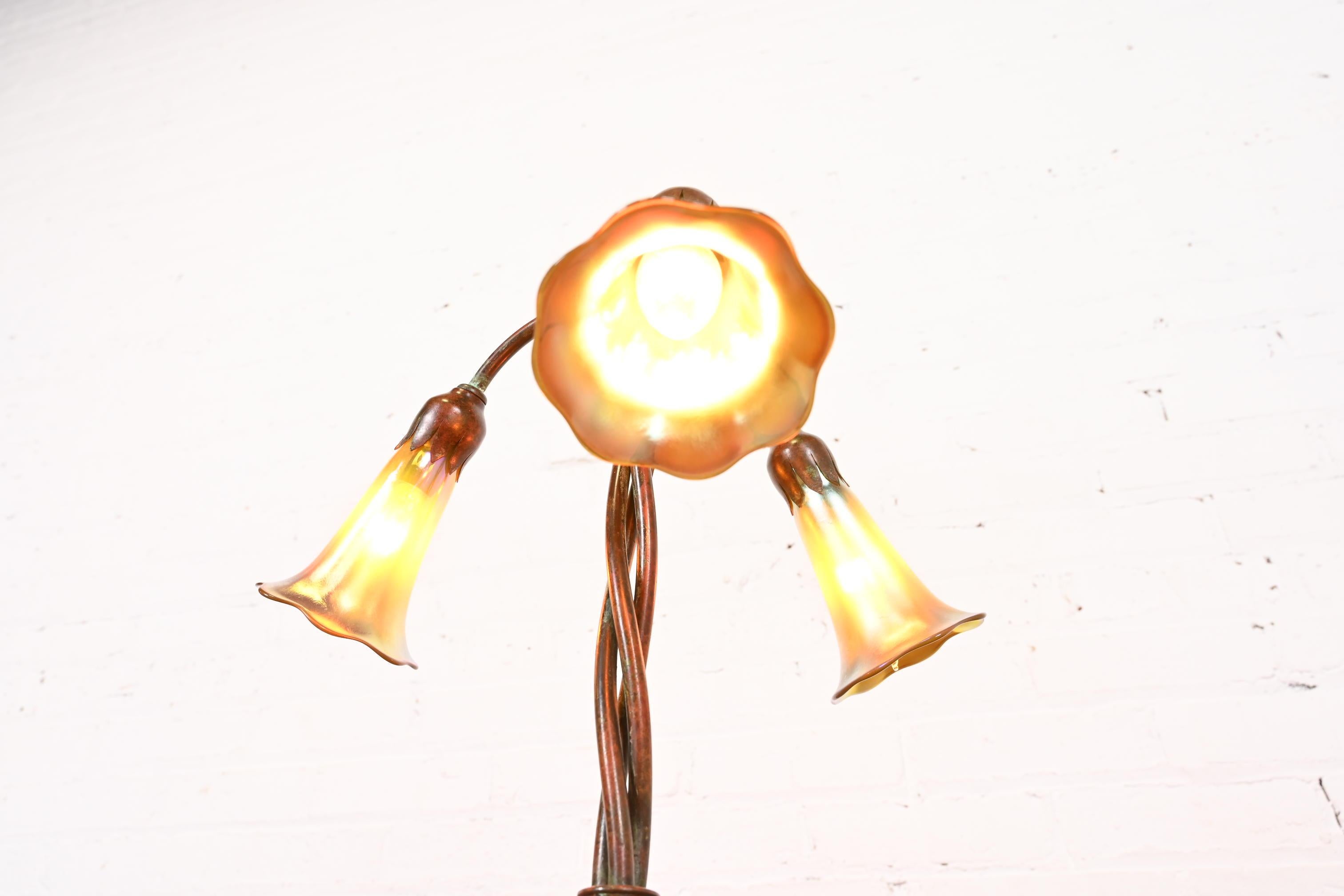 20th Century Tiffany Studios New York Bronze Three-Light Lily Table Lamp For Sale