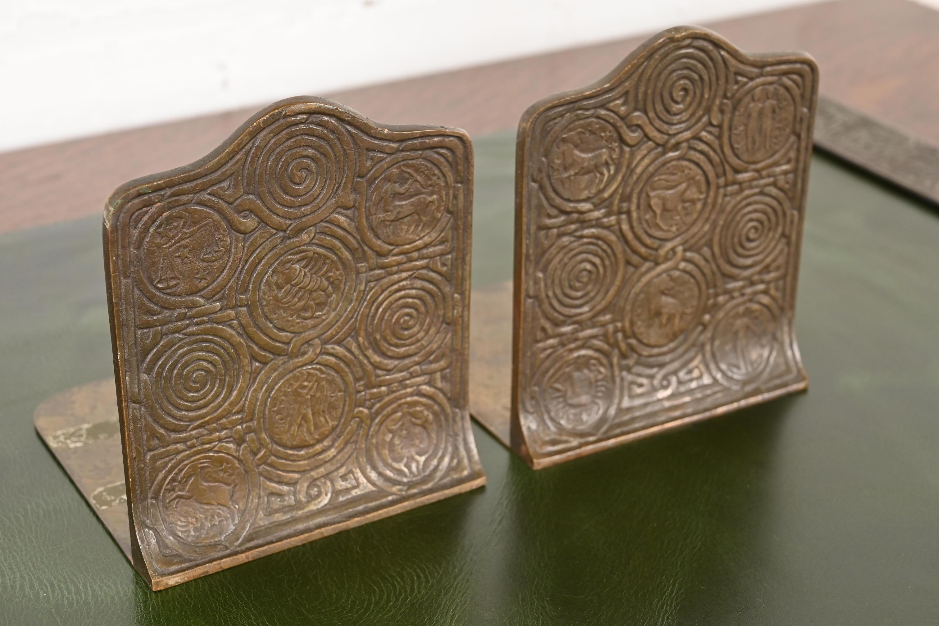 Tiffany Studios New York Bronze Zodiac Bookends, Circa 1910 In Good Condition For Sale In South Bend, IN