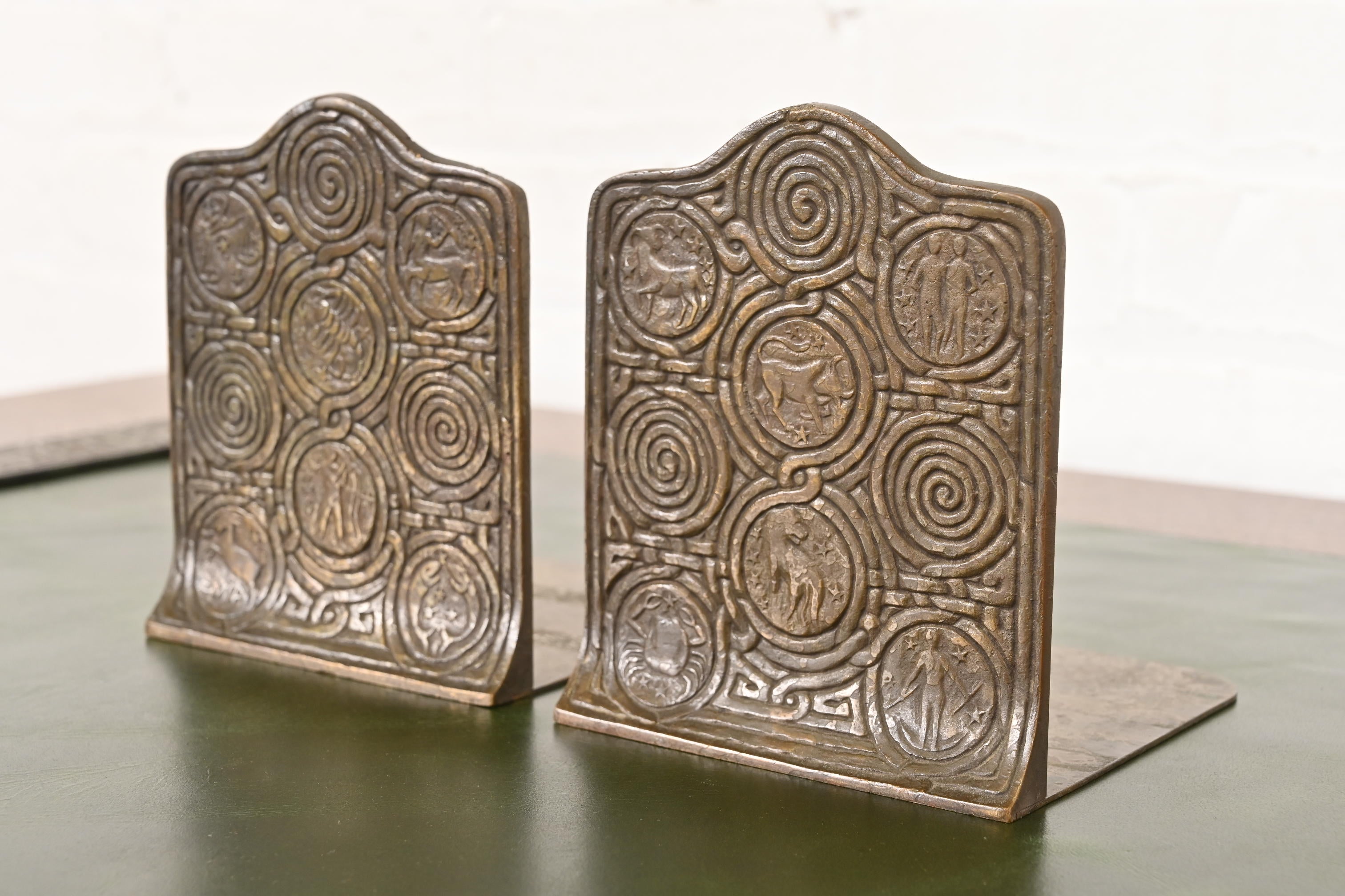 Tiffany Studios New York Bronze Zodiac Bookends, Circa 1910 For Sale