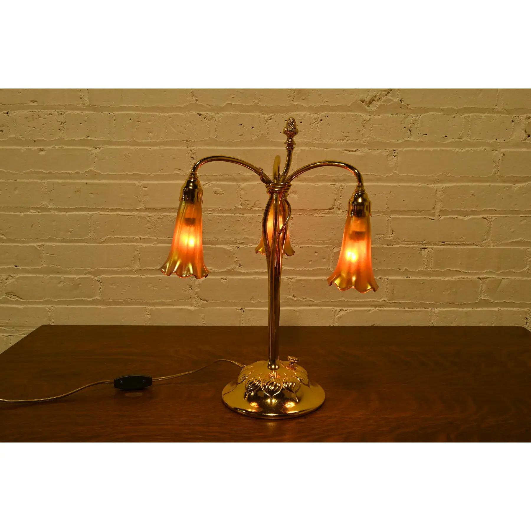 20th Century Tiffany Studios New York Gilt Bronze Three-Light Lily Table Lamp For Sale
