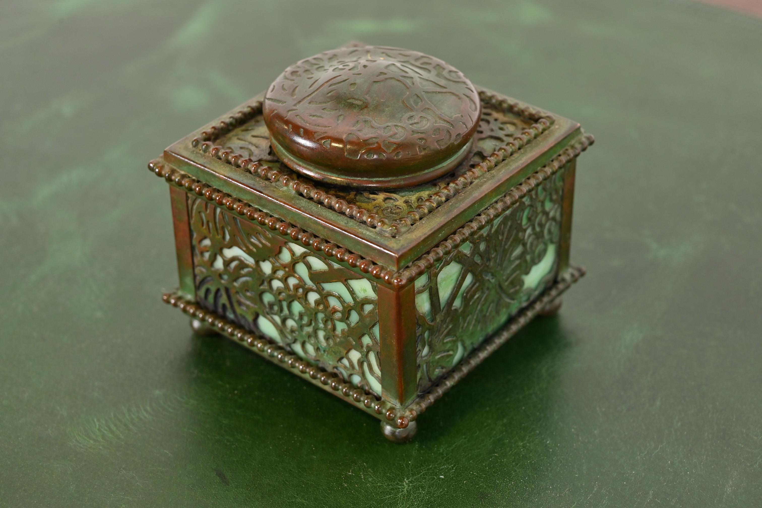 A gorgeous Arts & Crafts or Art Deco period bronze and slag glass 