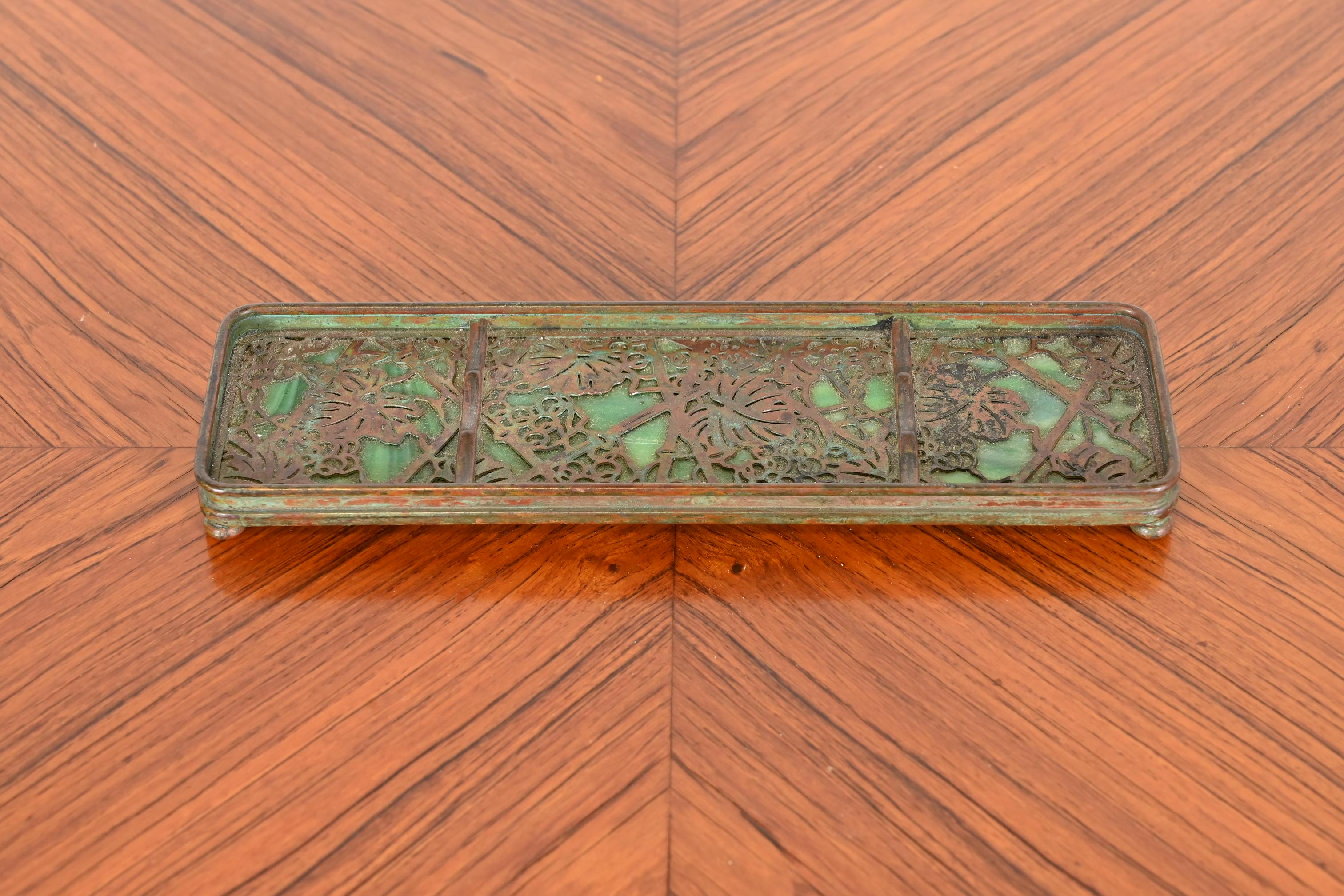 A gorgeous antique Art Nouveau pen tray

By Tiffany Studios

New York, USA, Early 20th Century

Measures: 9.5