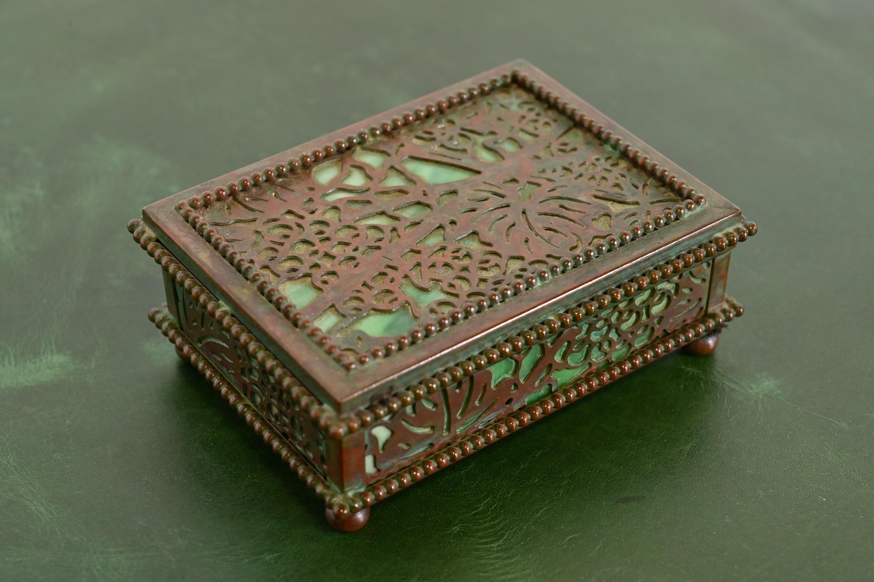 A gorgeous antique Arts & Crafts or Art Deco period bronze and slag glass 