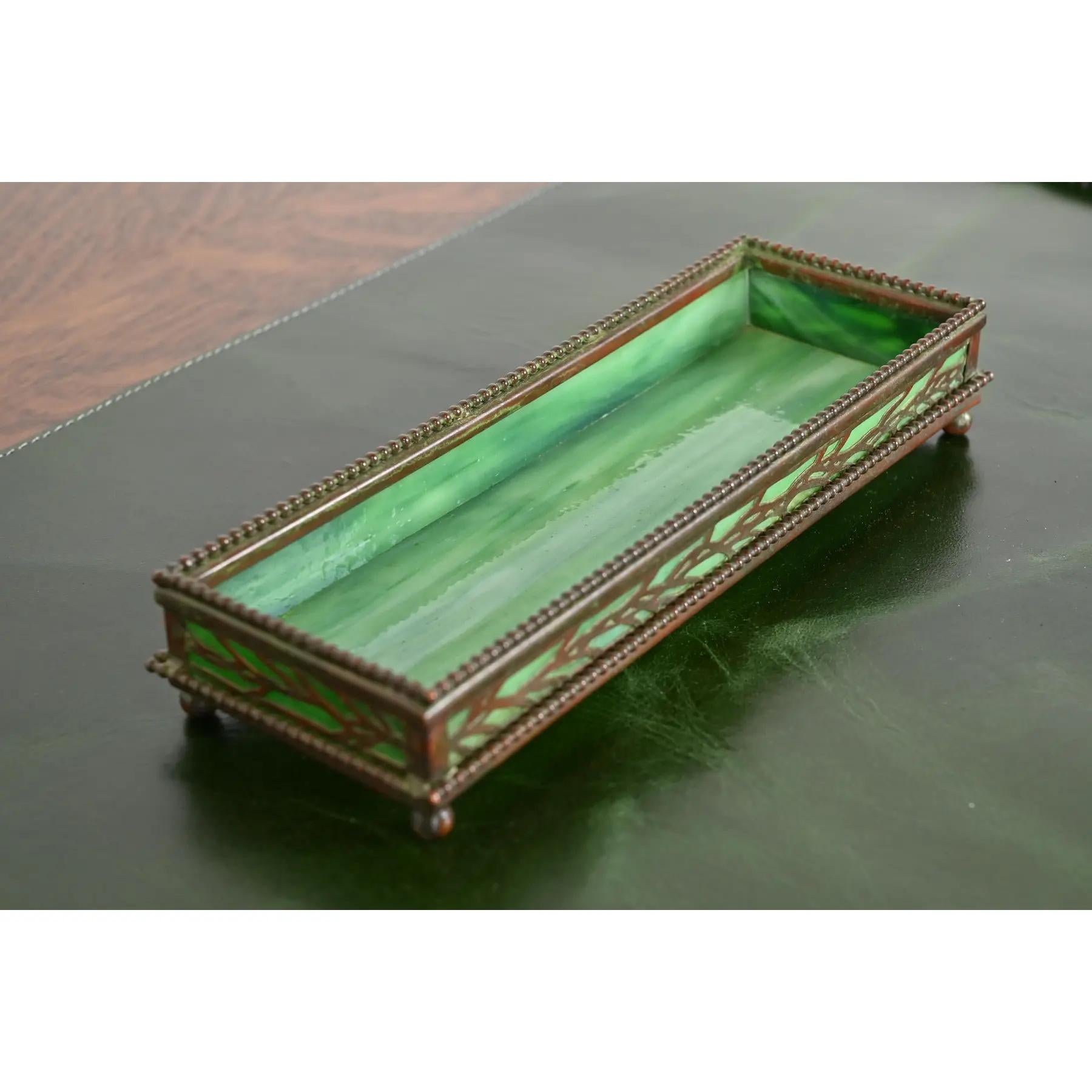 A gorgeous antique Arts & Crafts or Art Deco period bronze and slag glass 