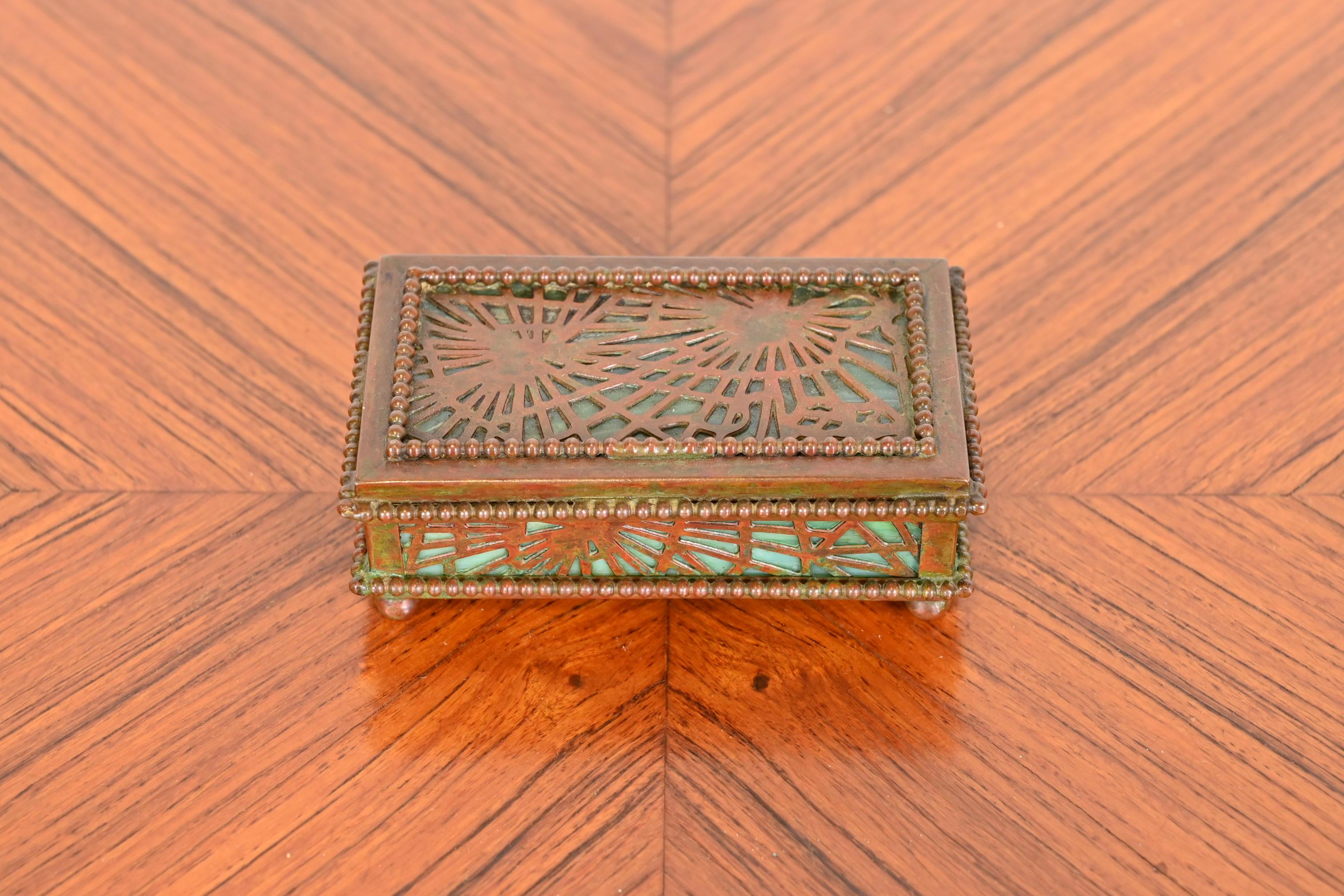 A gorgeous antique Art Nouveau stamp box

By Tiffany Studios

New York, USA, Early 20th century

Measures: 4