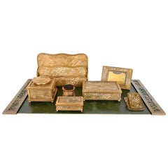 Tiffany Studios New York Pine Needle Bronze Doré and Slag Glass Eight-Piece Desk