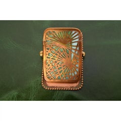 Tiffany Studios New York Fermaglio ad aghi di pino in bronzo e vetro scoria