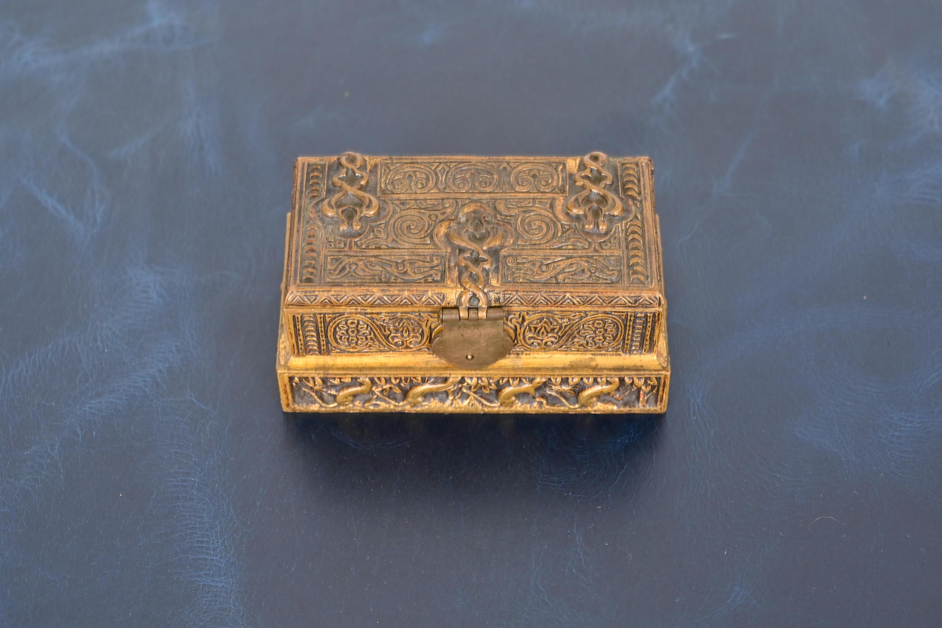 A gorgeous antique bronze stamp box in the Venetian design

By Tiffany Studios (signed to the underside)

New York, USA, Early 20th Century

Measures: 4