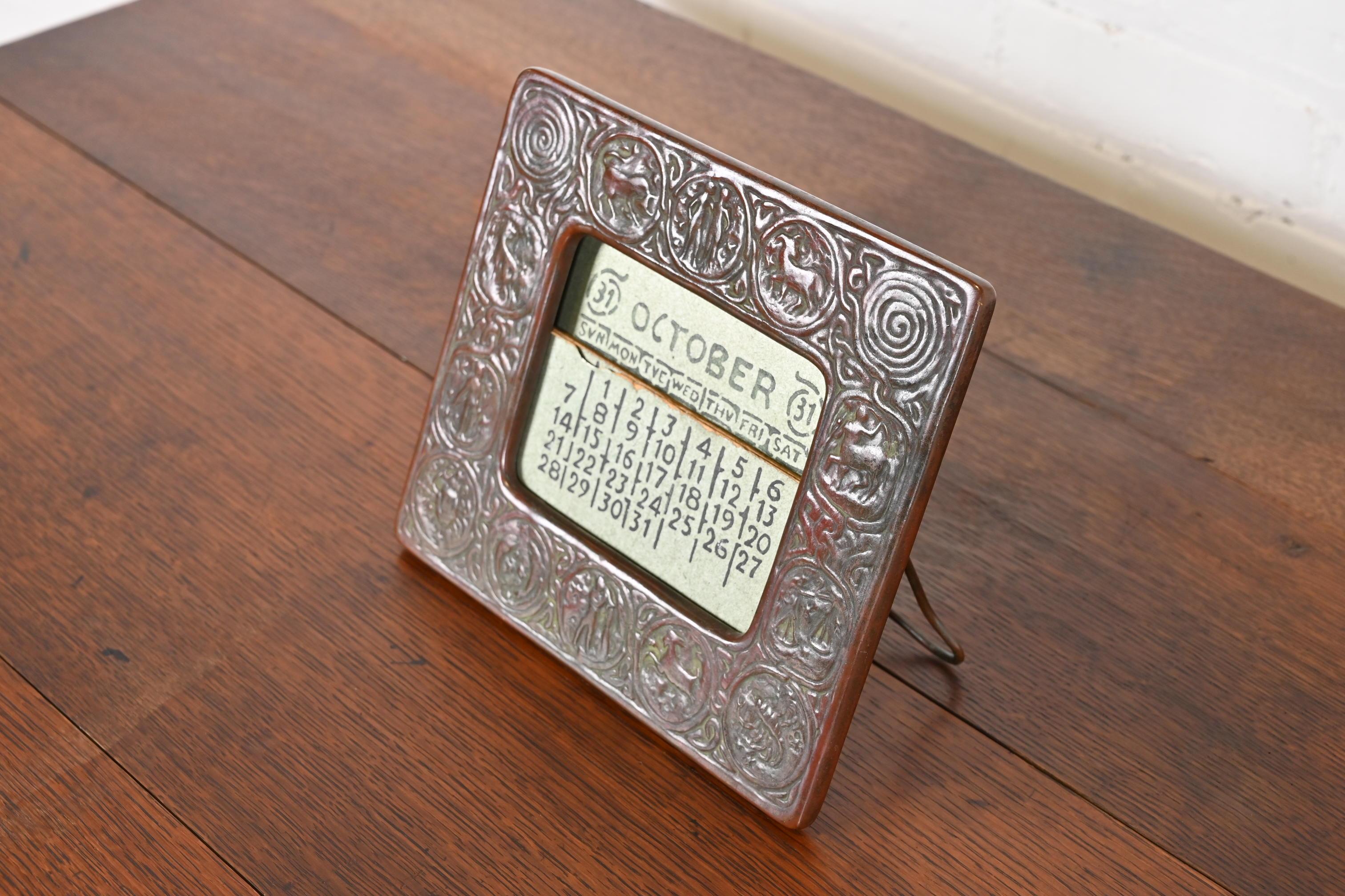 Tiffany Studios New York Zodiac Bronze Desk Calendar Holder or Picture Frame In Good Condition In South Bend, IN