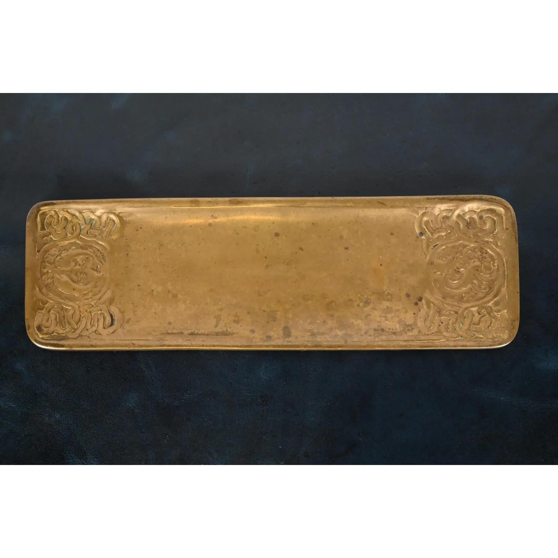 A gorgeous antique Arts & Crafts gilt bronze pen tray featuring Zodiac designs

By Tiffany Studios (signed to the underside)

New York, USA, Early 20th Century

Measures: 10