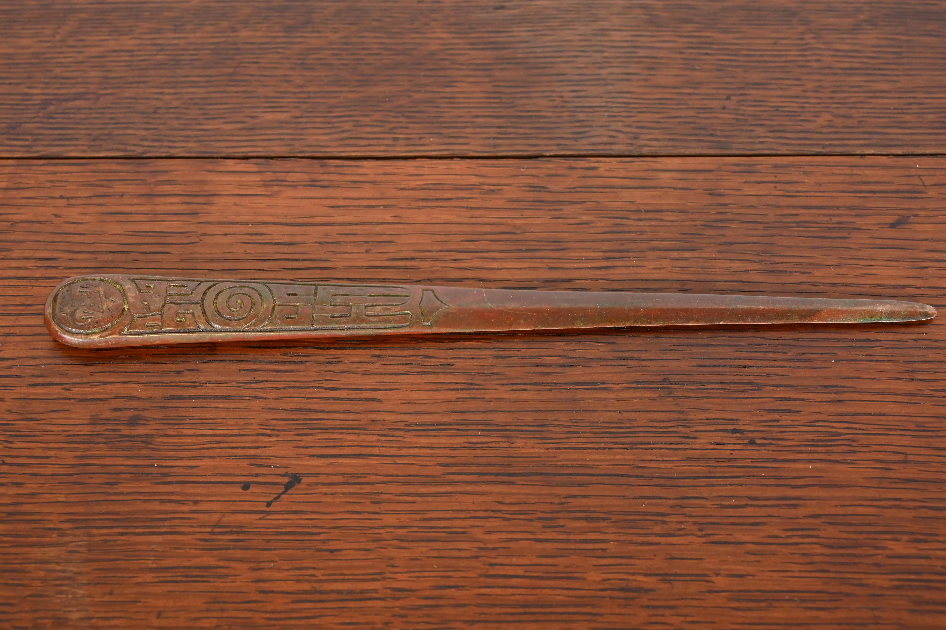A gorgeous antique bronze Zodiac letter opener

By Tiffany Studios (signed on the side)

New York, USA, Early 20th Century

Measures: 10.5