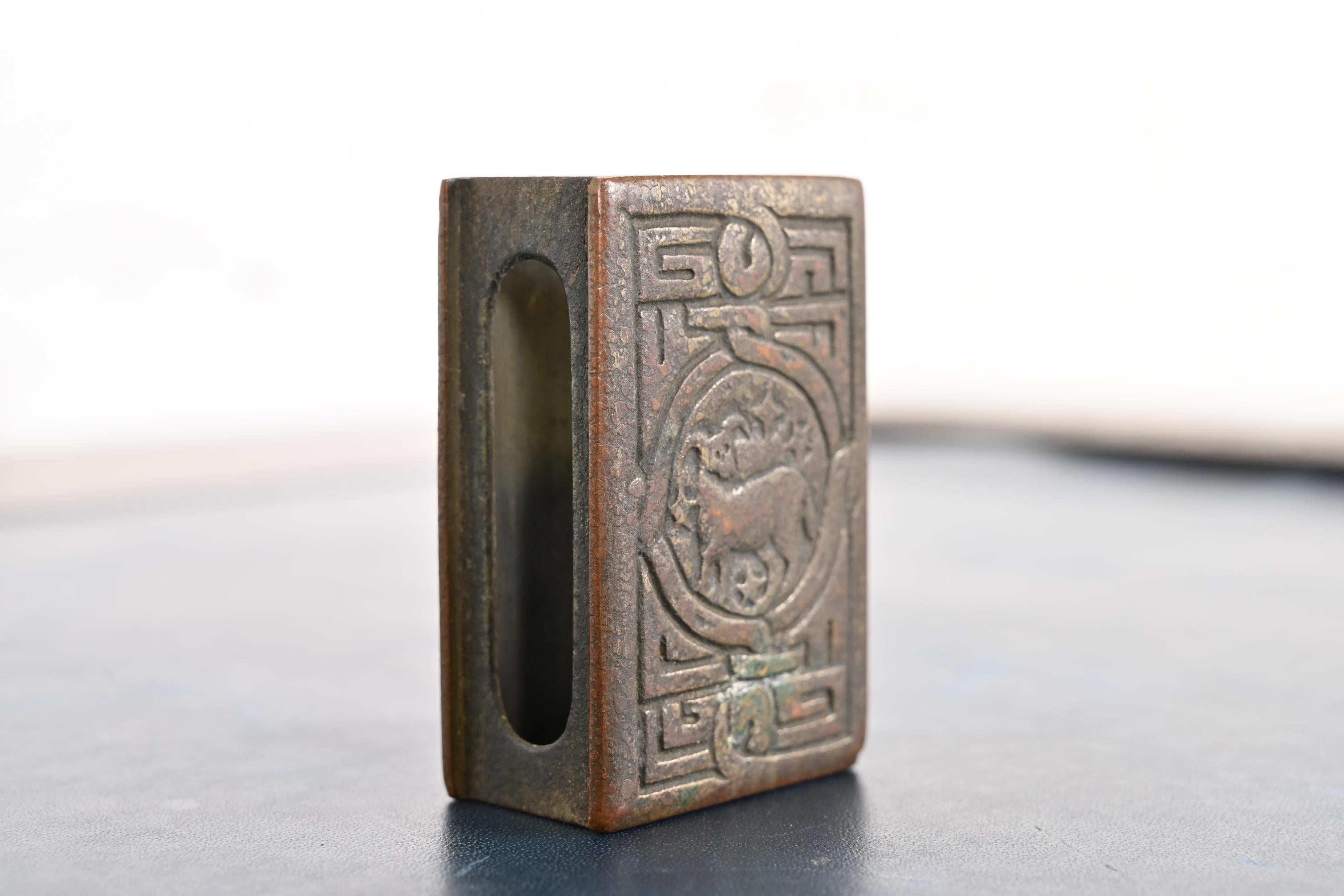 20th Century Tiffany Studios New York Zodiac Pattern Bronze Match Box Holder For Sale